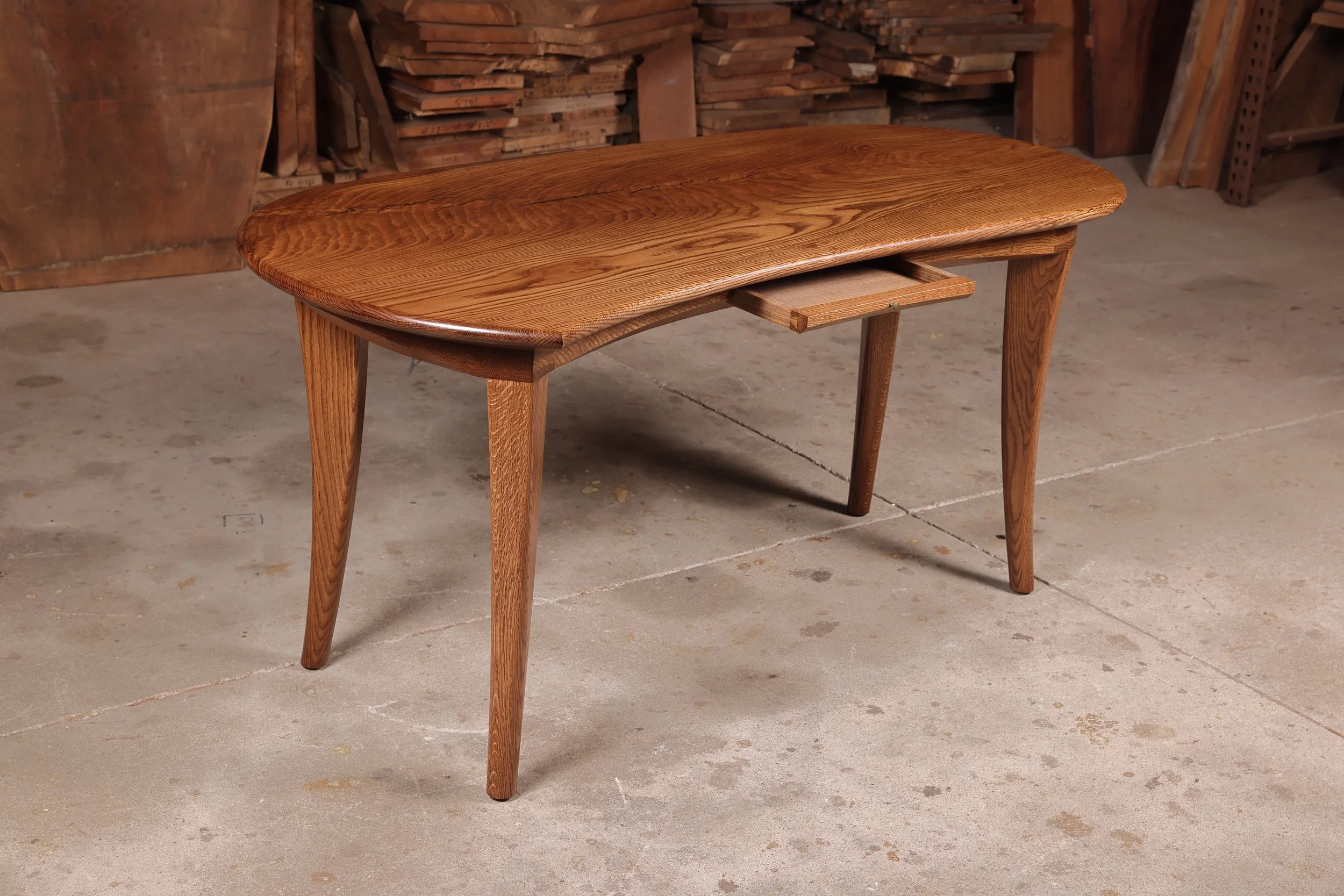 Custom made Wharton Esherick style white oak desk with pencil drawer.