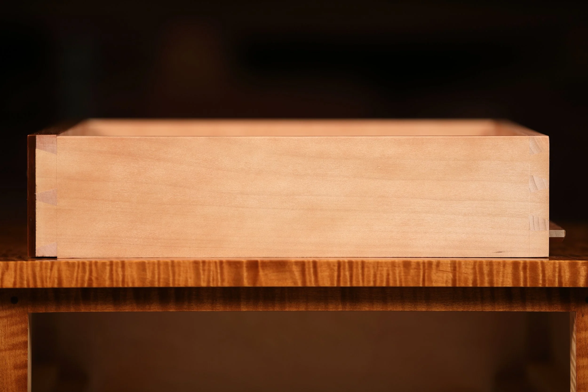 Hand cut dovetail drawer construction.