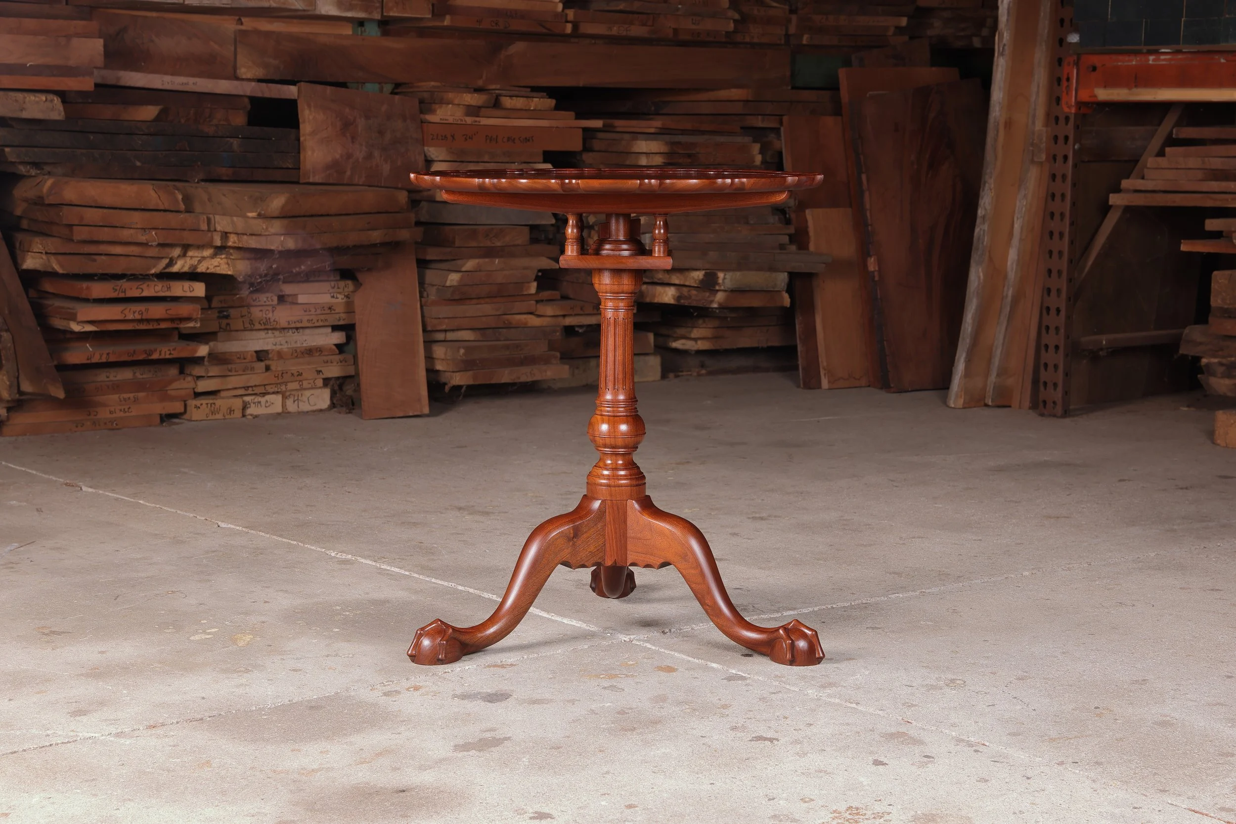 Irion Company walnut piecrust tea table. Side one condition photo.