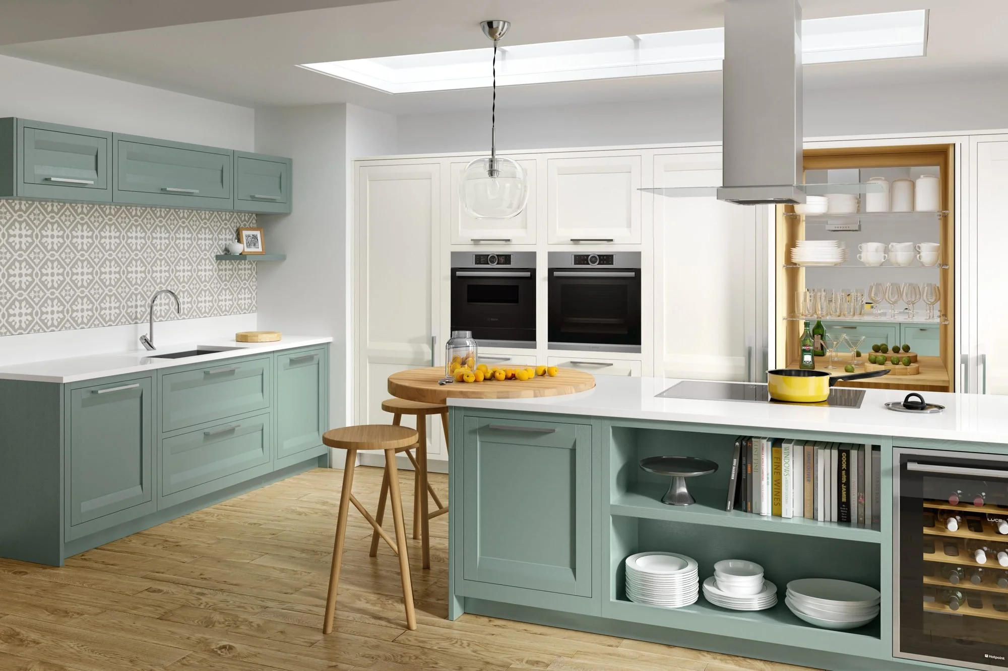 L-shaped kitchen in soft teal and white, with the sink run under the wall cabinets and open shelving at the end of the hob run