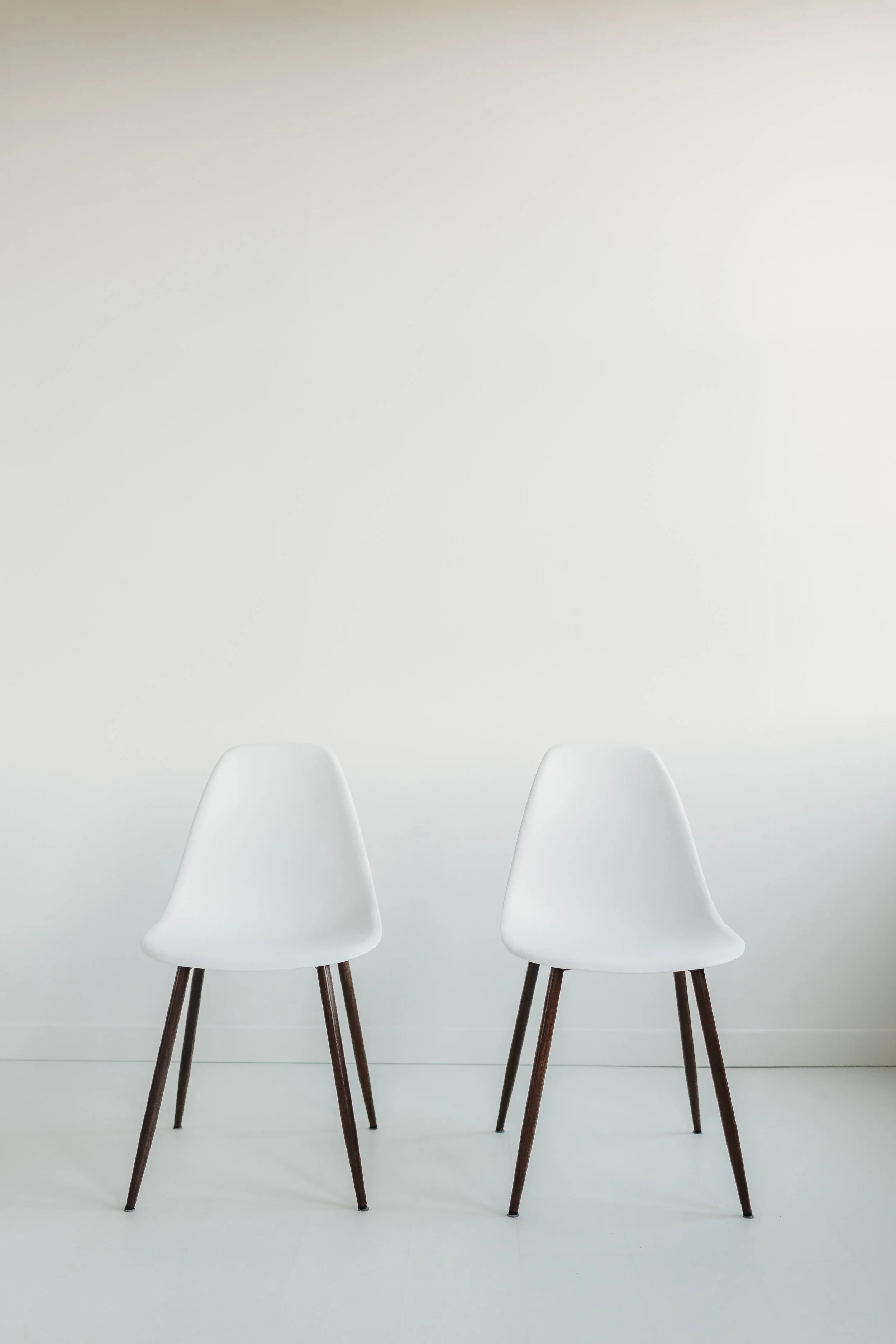 Two White Chairs