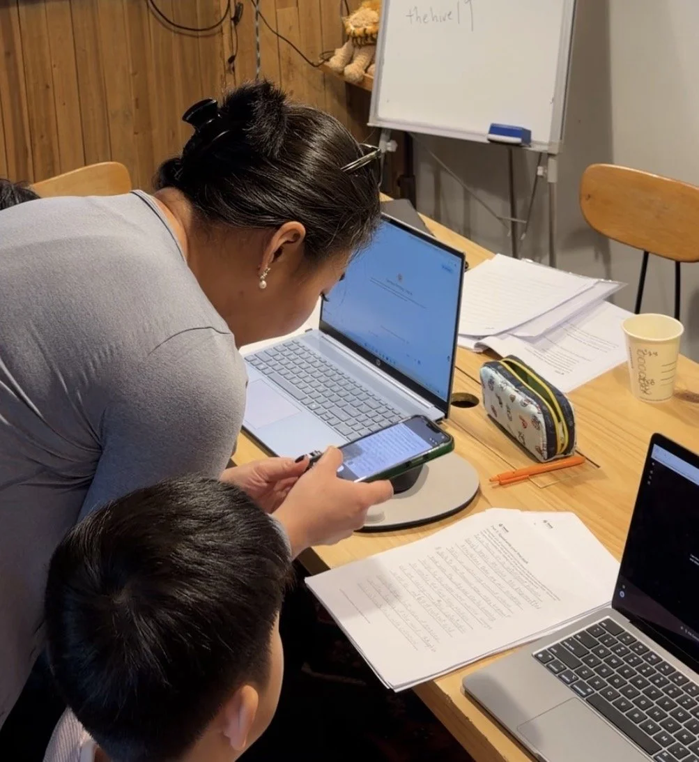 Jen taking photo of student essay.jpg