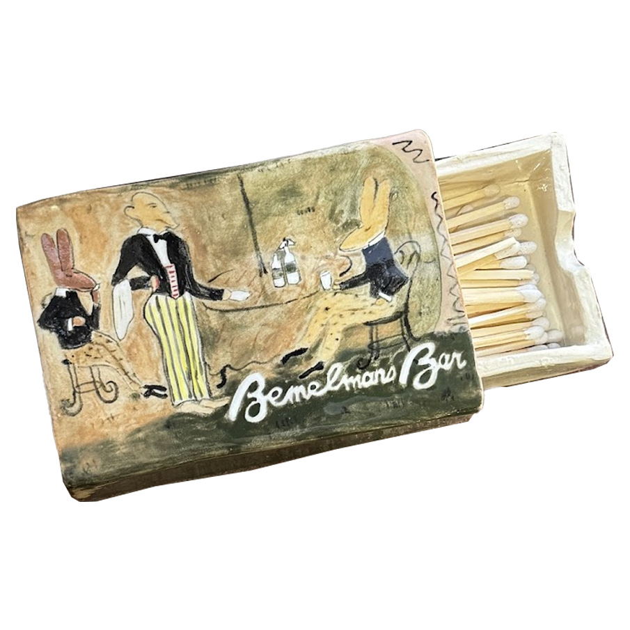 Ceramic matchbox depicting Bemelman's bar scene