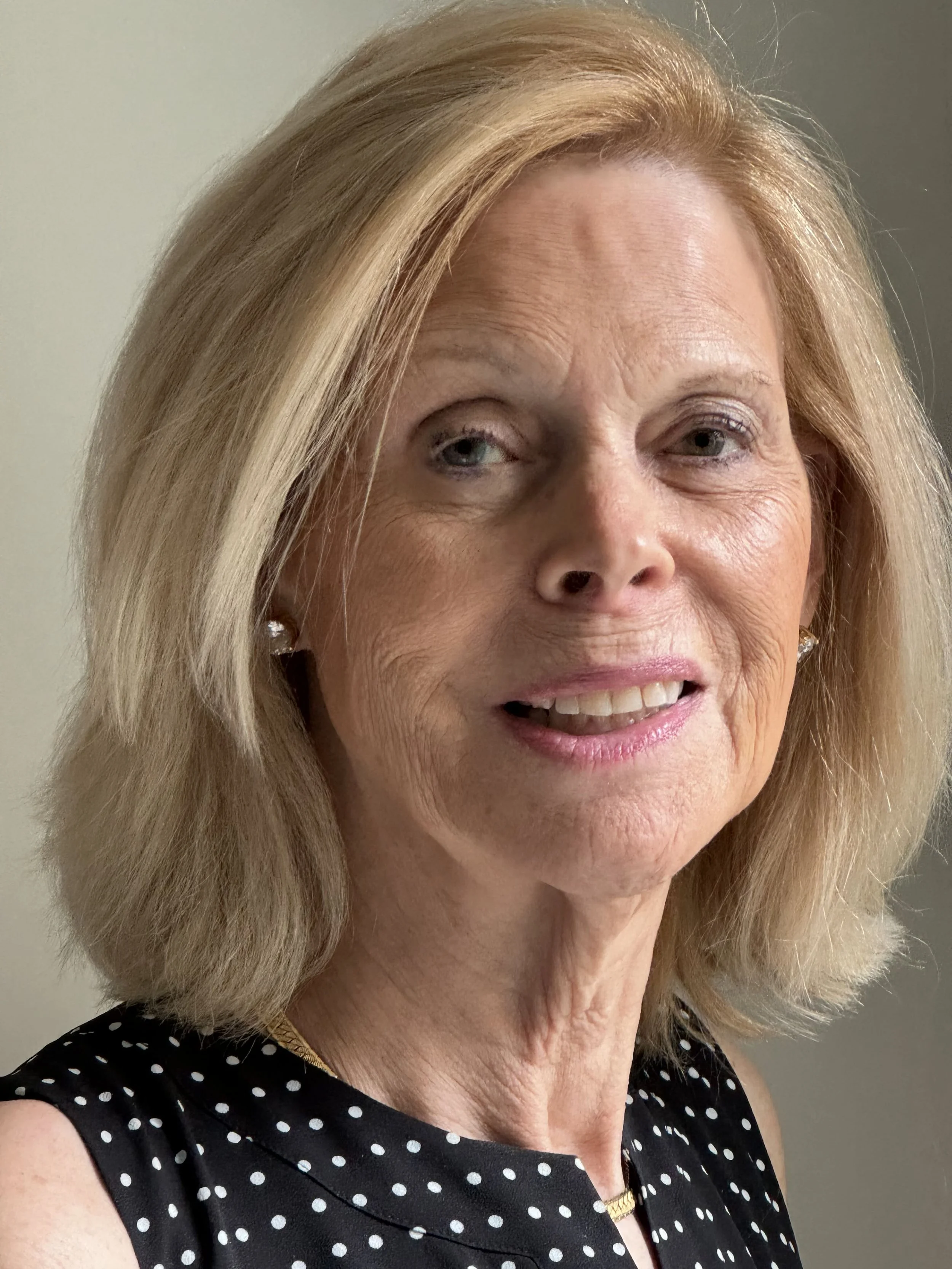 A photo of Priscilla Bright smiling at the camera.