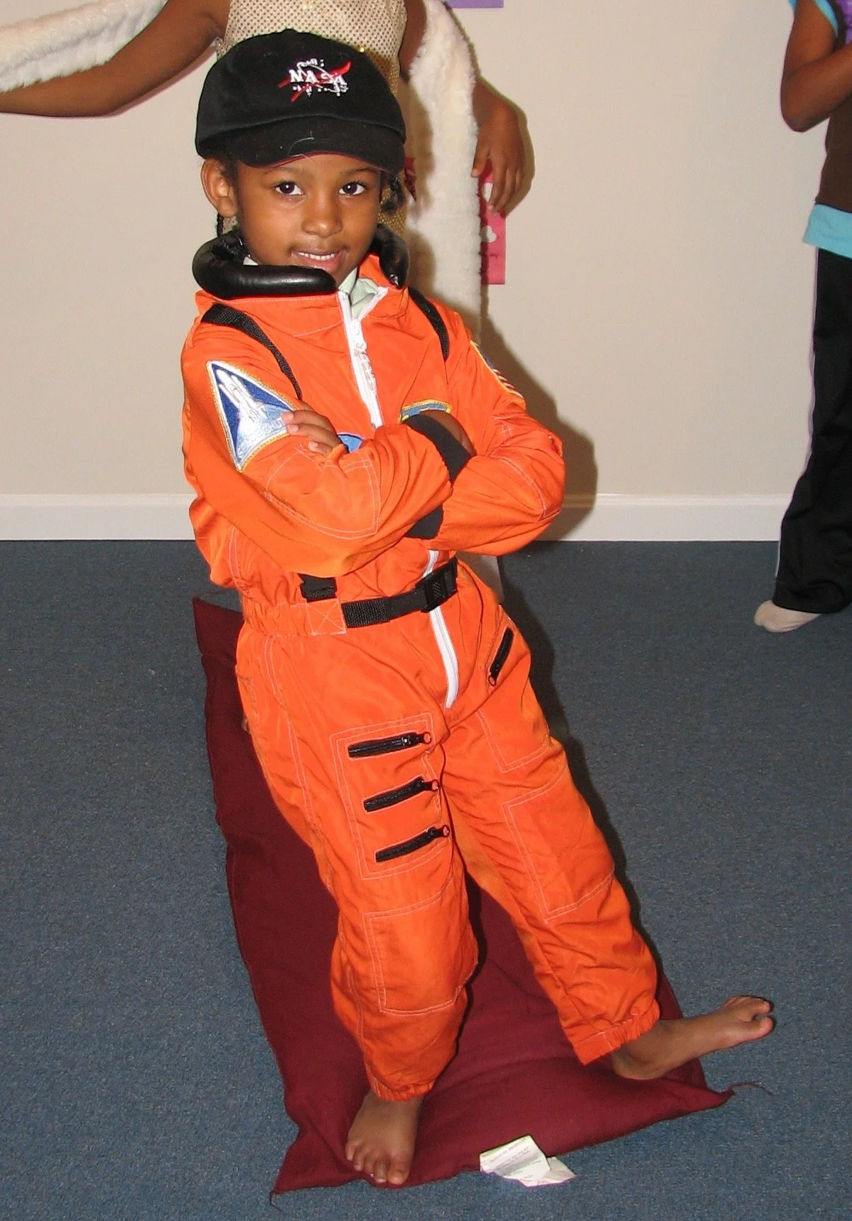 Young Julia Hay in an astronaut costume.