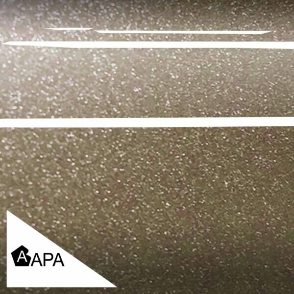 Textured metallic bronze surface with APA logo.