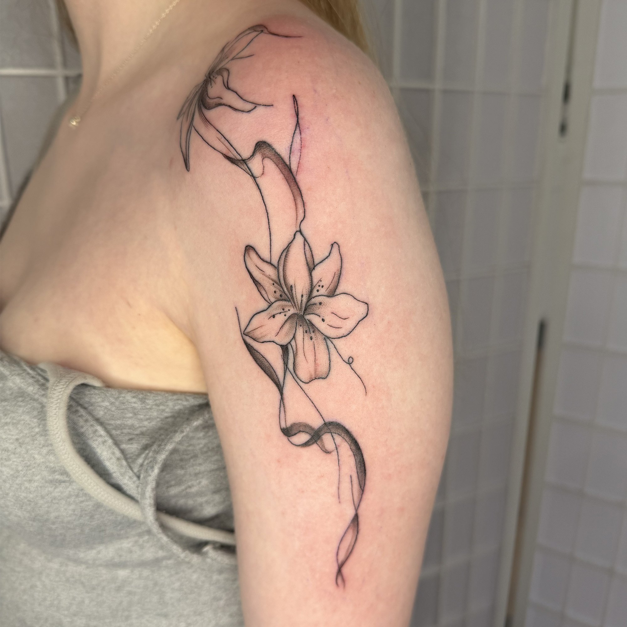 Fineline-freehand-shoulder-lilies-pinterest-tattoo.jpg