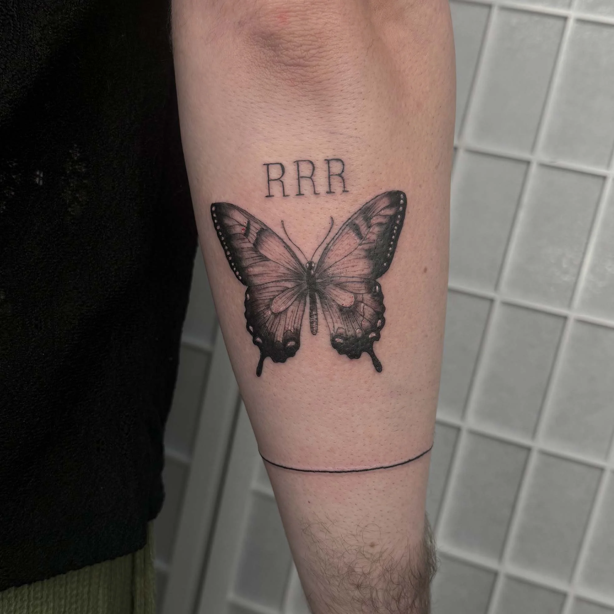 fine-line-butterfly-tattoo.jpg