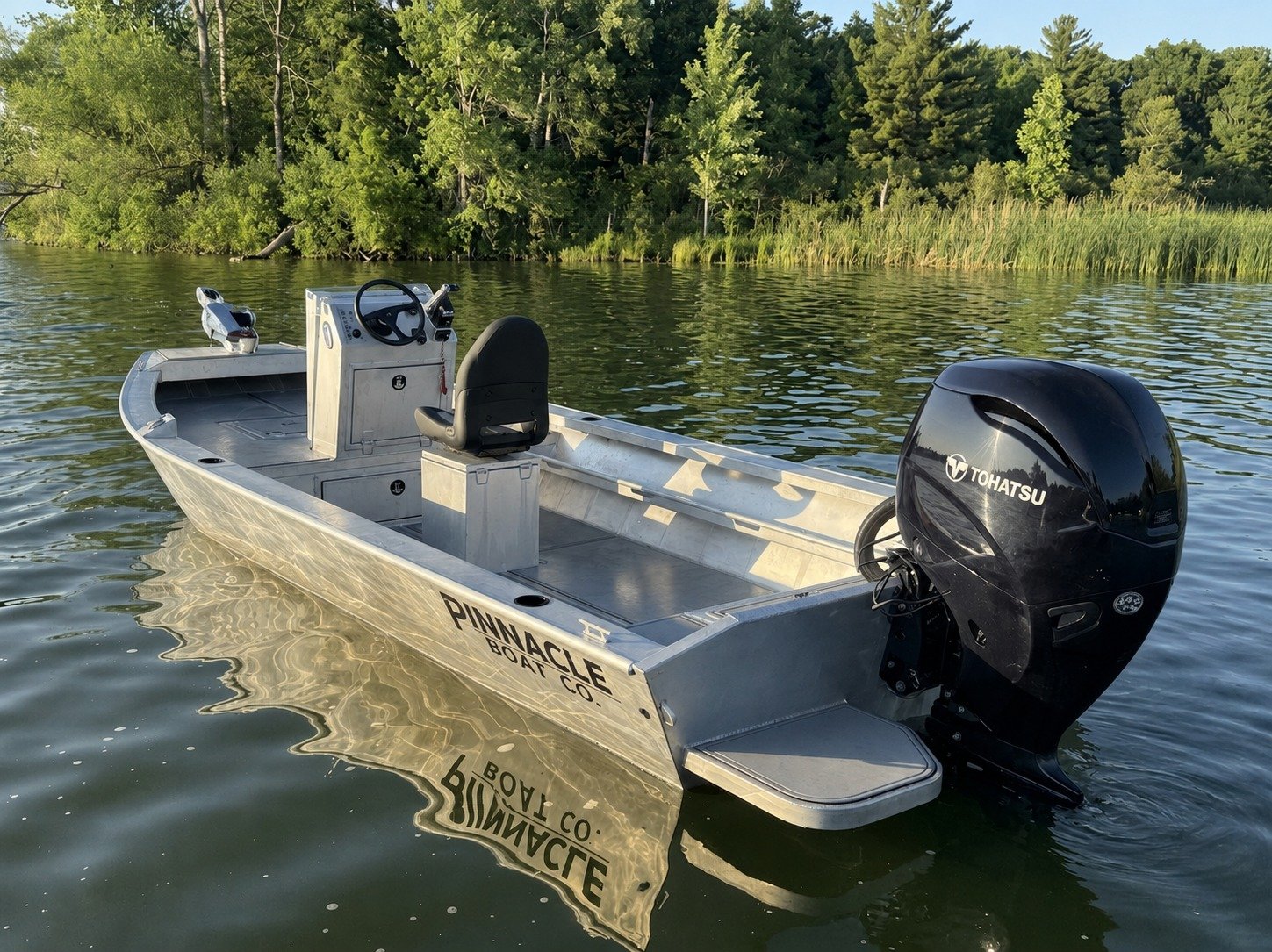 Our 1860 Jet shining in the sun. We are only getting started. See below for details!
- 18&rsquo; long
- 60&rdquo; bottom
- 84&rdquo; beam
- .19&rdquo; bottom and transom
- .16&rdquo; sides, gunnels, and nose
- Tunnel hull
- 6&deg; deadrise
- Fully we