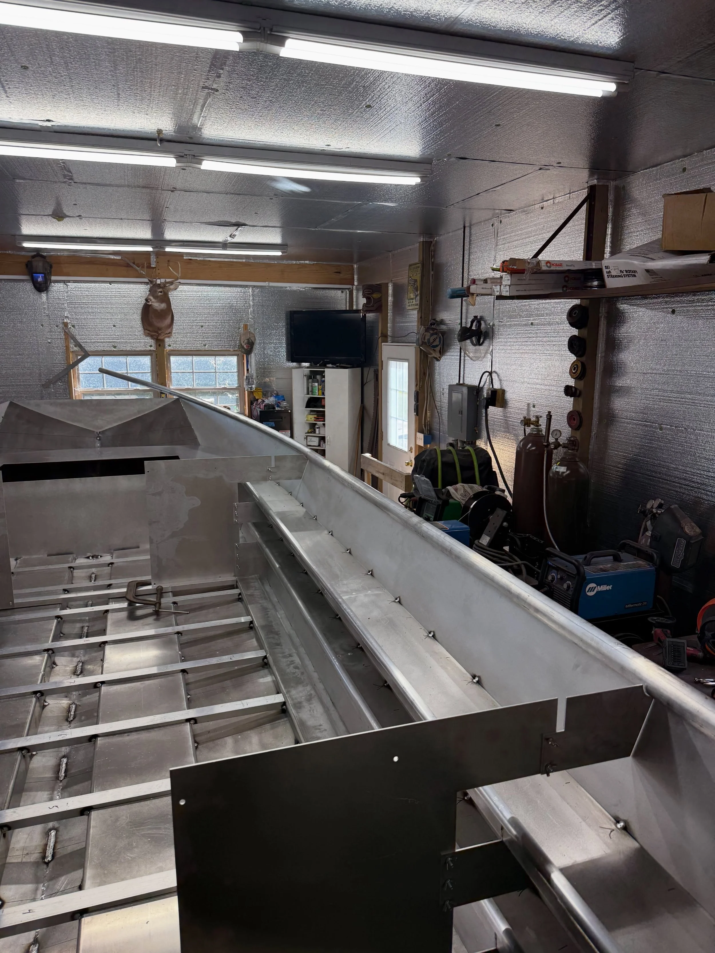 A number of things different this time around. All about increasing efficiency without sacrificing quality so the build timeline can remain as low as possible. Some quick fixturing plates to locate the dual rod trays and gunnels saved a ton of time o