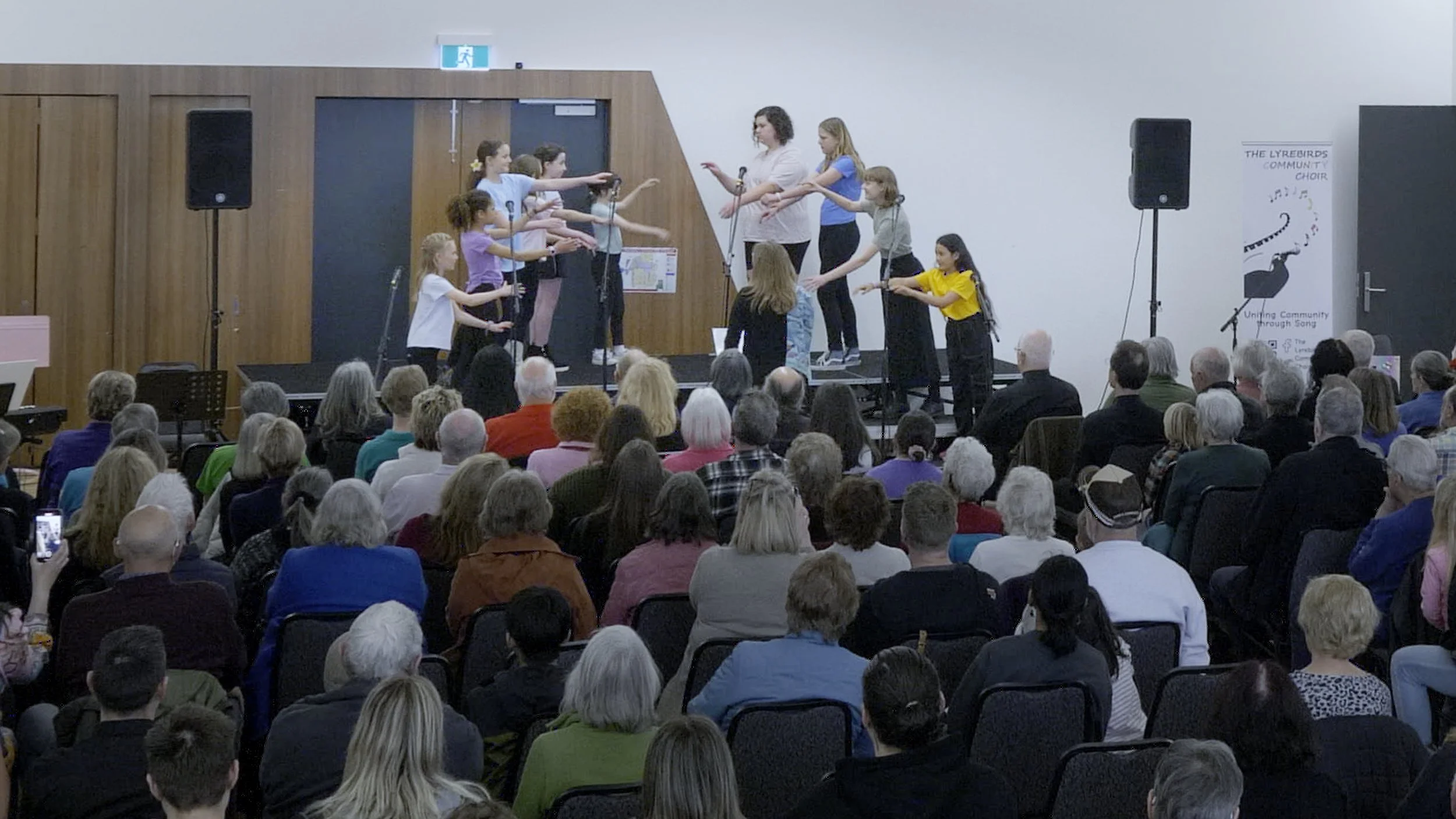 Tune In Kids at Sing for Unity Concert in Enmerald 2025. Performing The Seed by Aurora