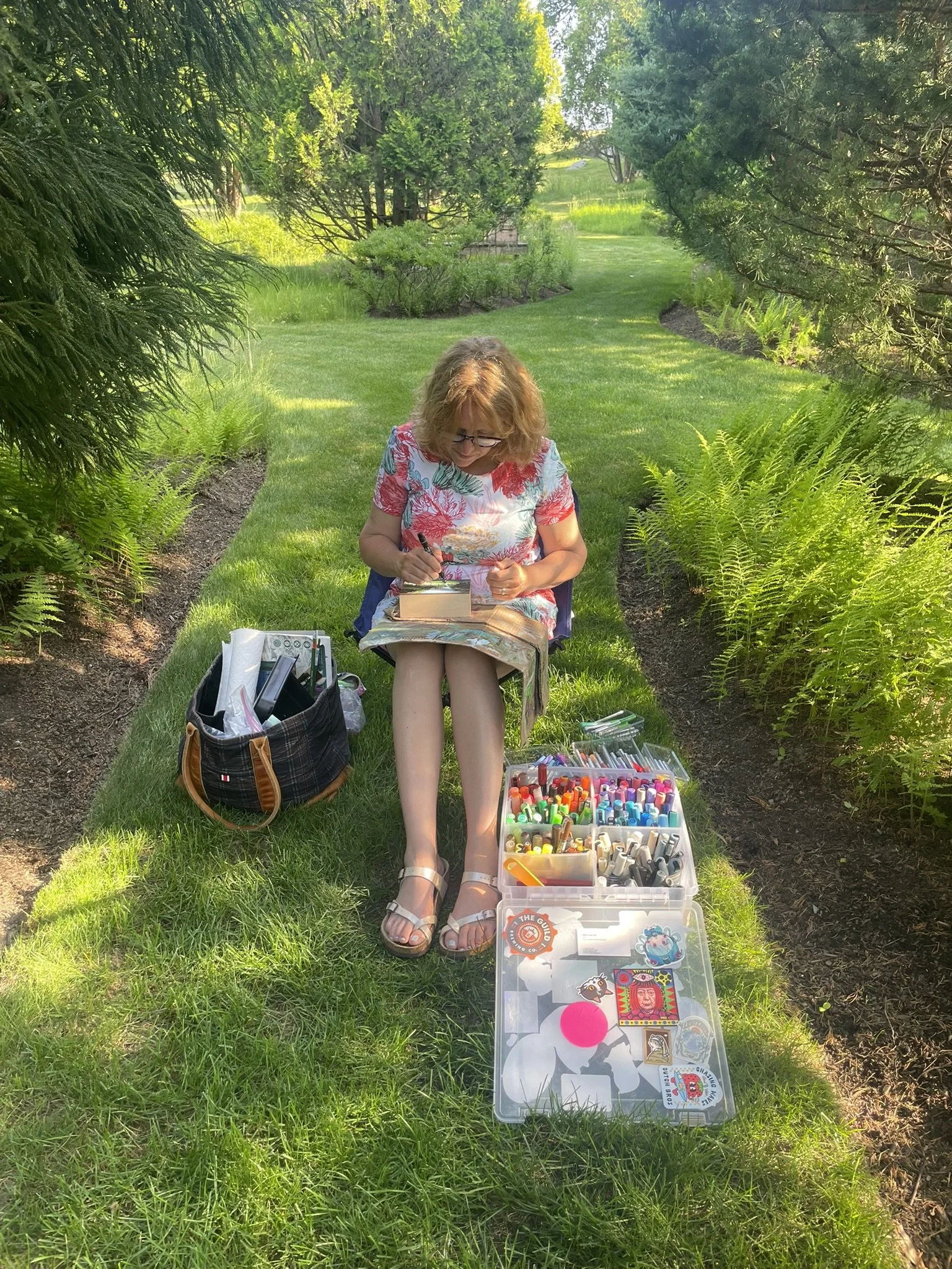 Rhode Island artist Erica Driver painting "Secret Path" at Blue Garden, Newport, Rhode Island, summer 2026