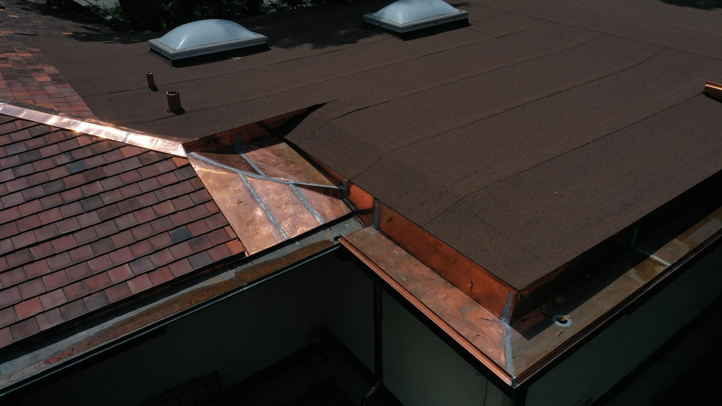 Clay Tiles, Flat Roof and Copper Work