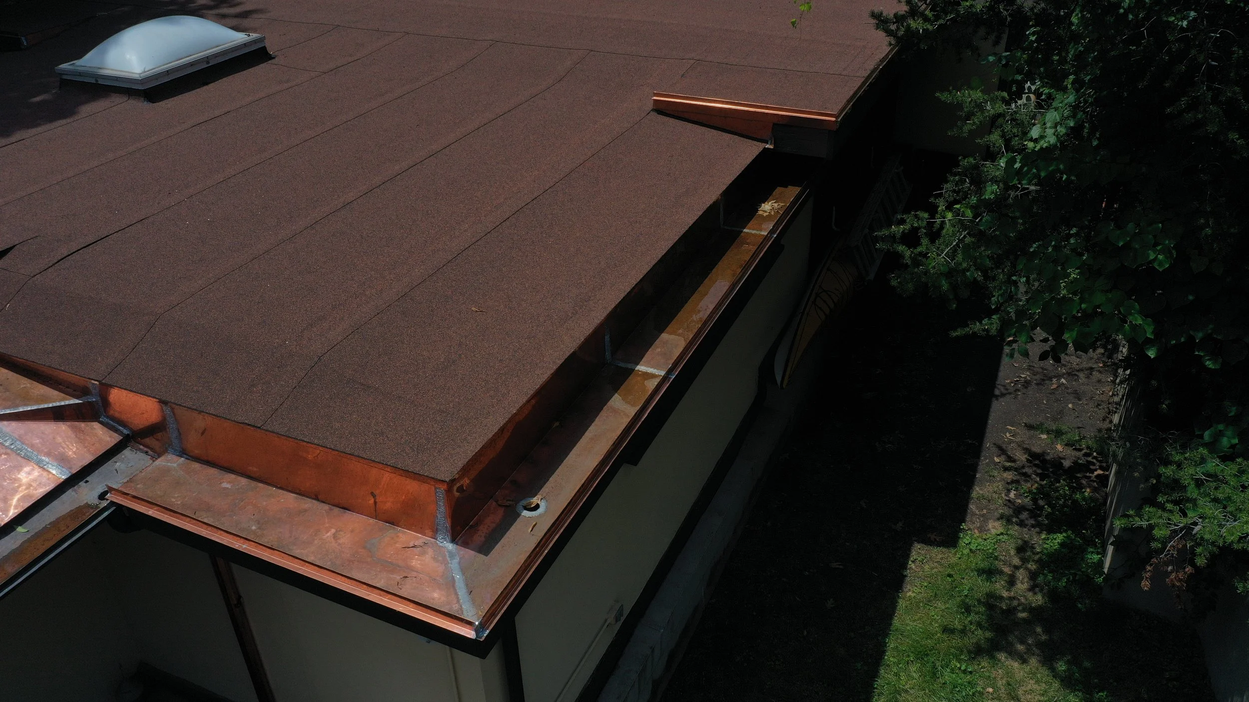 Modified Bitumen Flat Roof and Copper Gutters