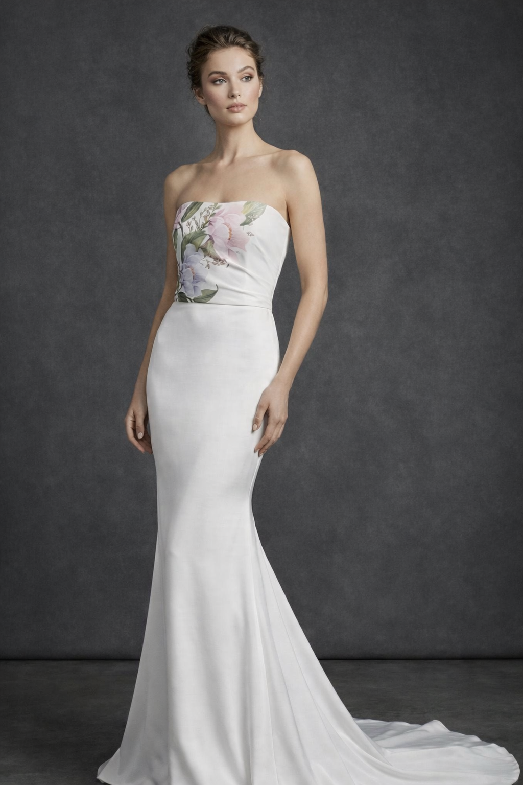A minimalist fitted wedding gown featuring a smooth silhouette and timeless couture craftsmanship.