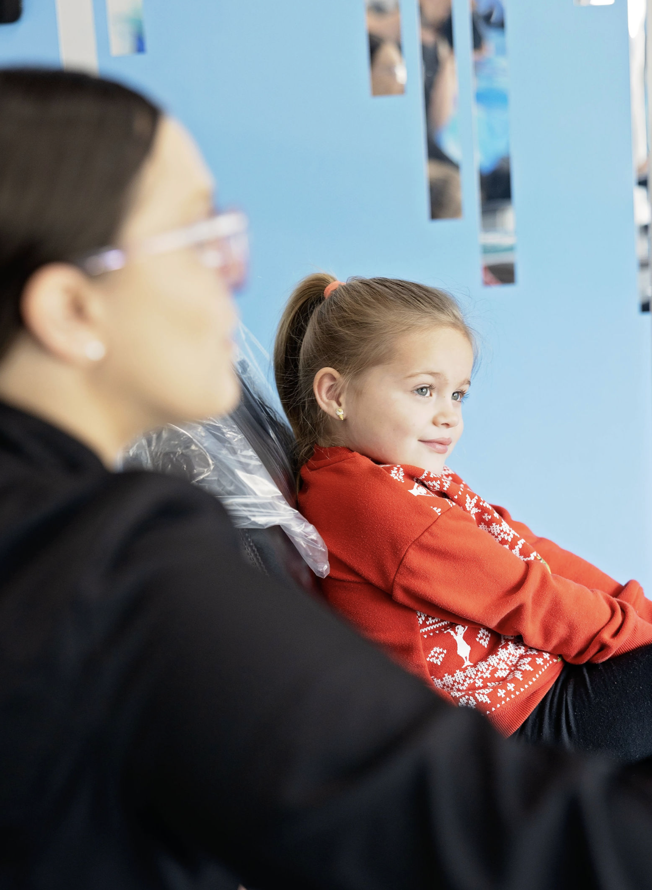 Young girl in chair during her visit