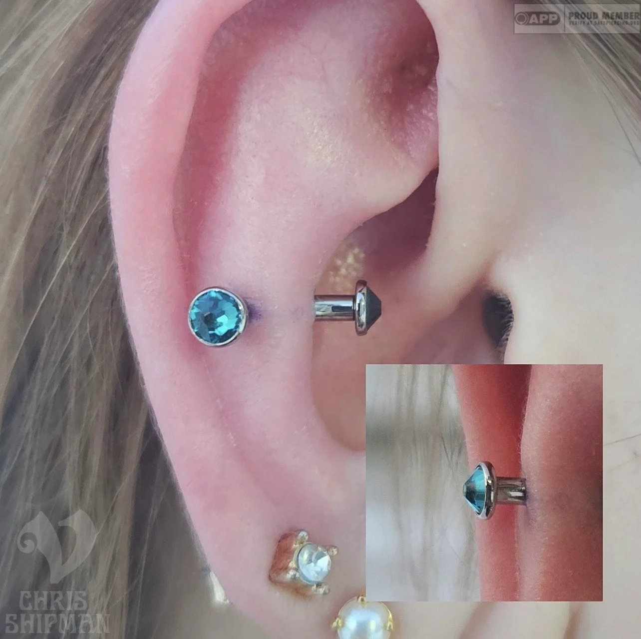 Fresh 12g snug piercing by Chris Shipman at Visions Tattoo Gallery featuring implant-grade titanium jewelry from Anatometal in Medway MA.