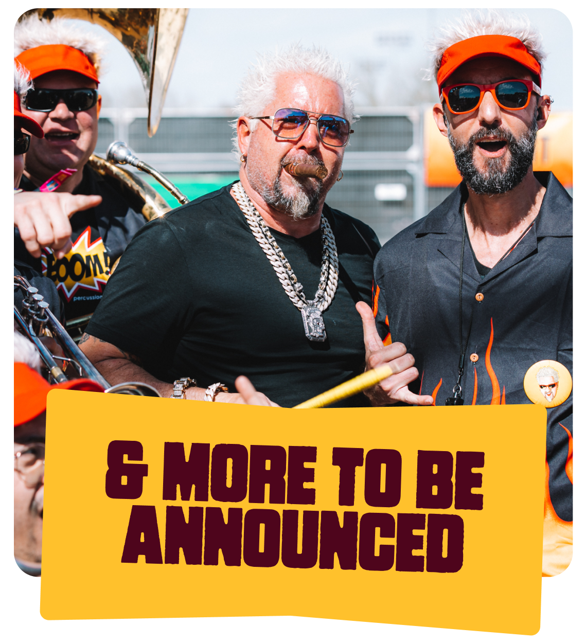People attending a tailgate or outdoor event during the Big Game Weekend 2023, with a large orange banner reading 'Big Game Weekend 2023' and a crowd seated at picnic tables eating and socializing.