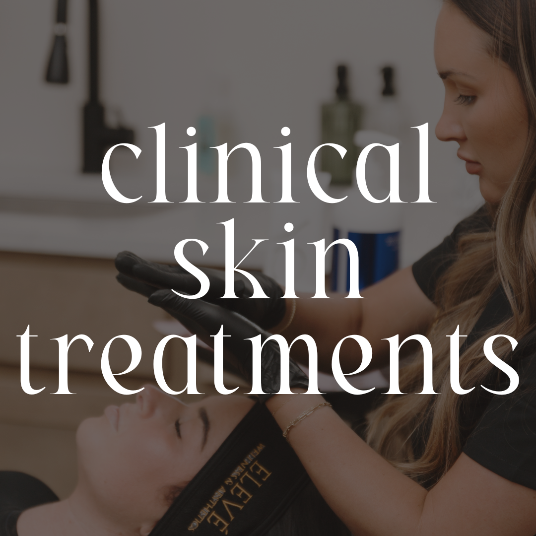 A woman receiving a skincare treatment from a professional in a clinic setting.