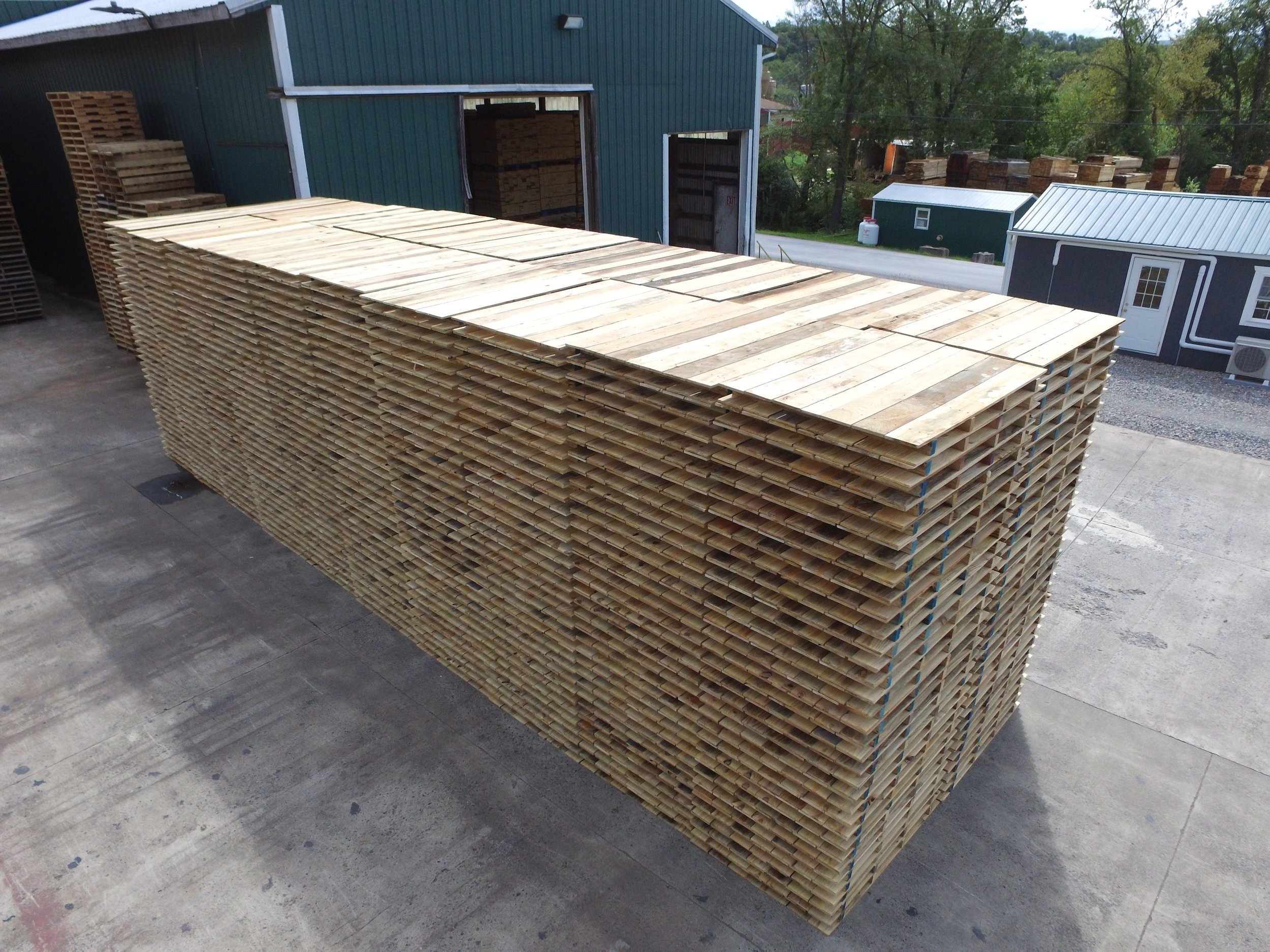 stacks of wooden pallets from Bridger Creek LLC