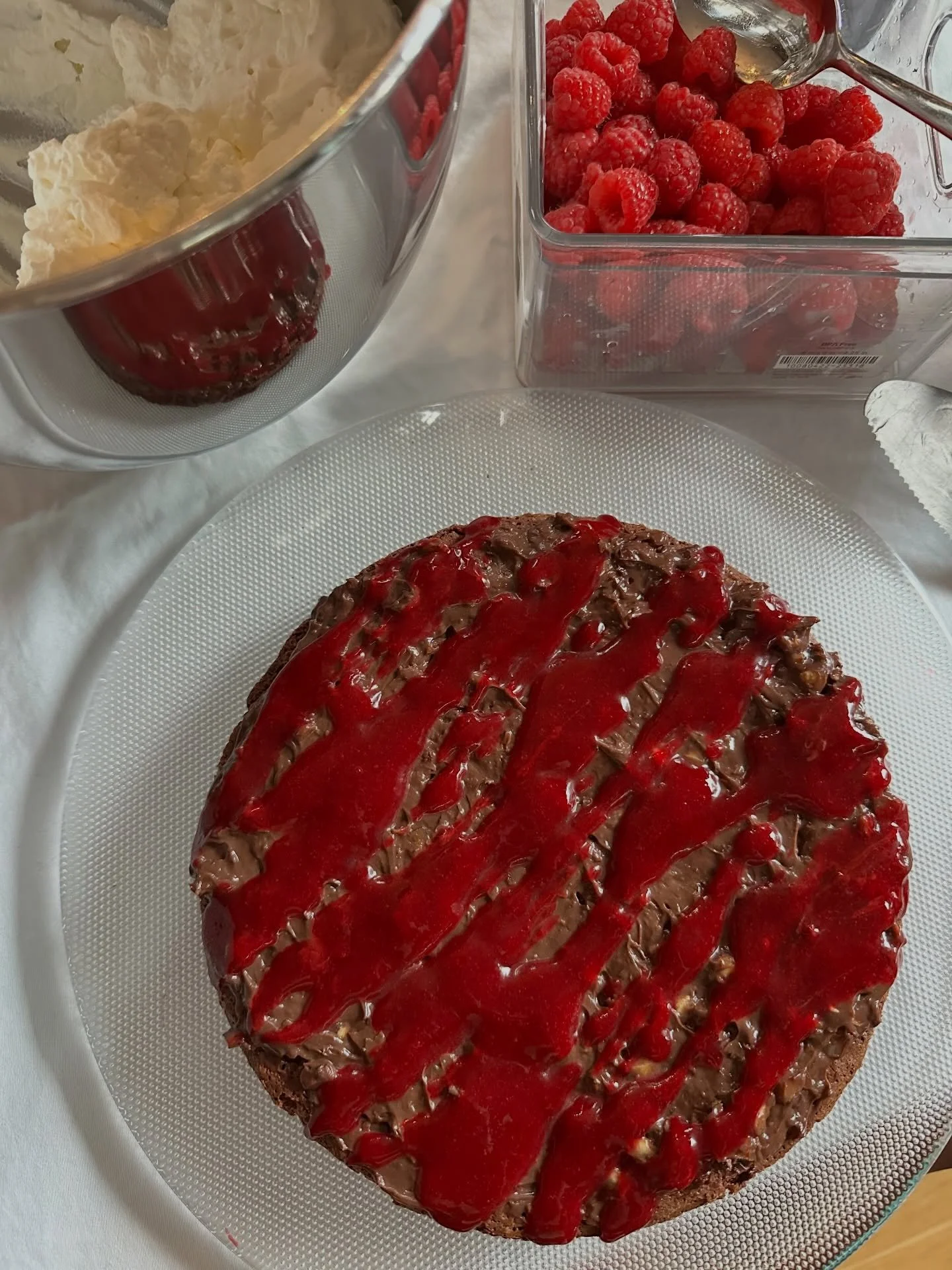 Flourless Chocolate Cake with Hazelnut Ganache, Raspberry Couli &amp; Whipped Cream 🔥

Gluten free &amp; on the dessert menu this week!