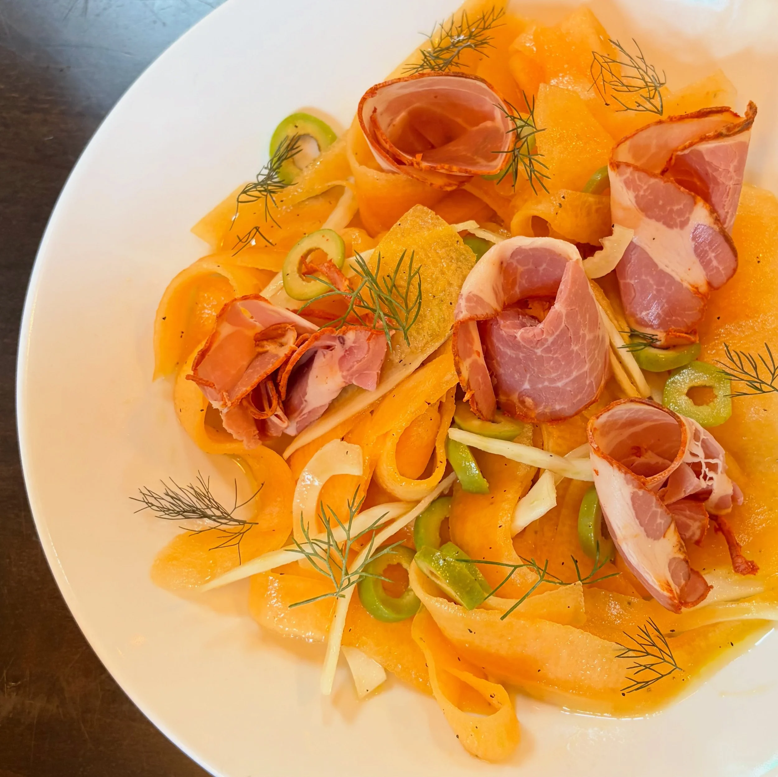 New end-of-the-summer dish: 
Shaved Cantaloupe Salad
Cantalaoupe. Capicola. Caselvestrano Olives. Fennel. Dressing of melon &amp; elderflower liquor.