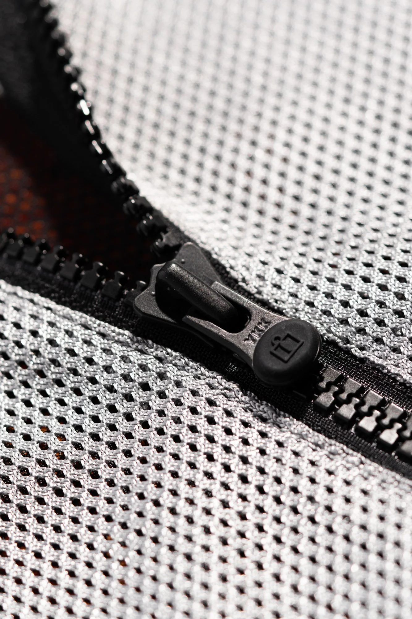 MeshAFCEJacket_HiViz_ZipperDetail.jpg