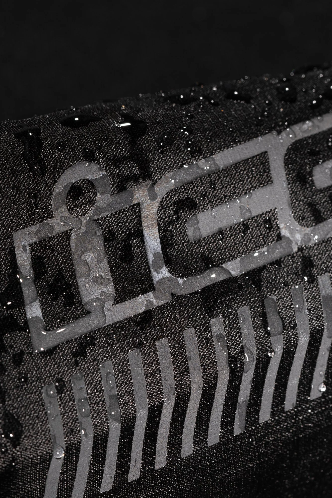 PDX3Jacket_Black_WetDetail.jpg