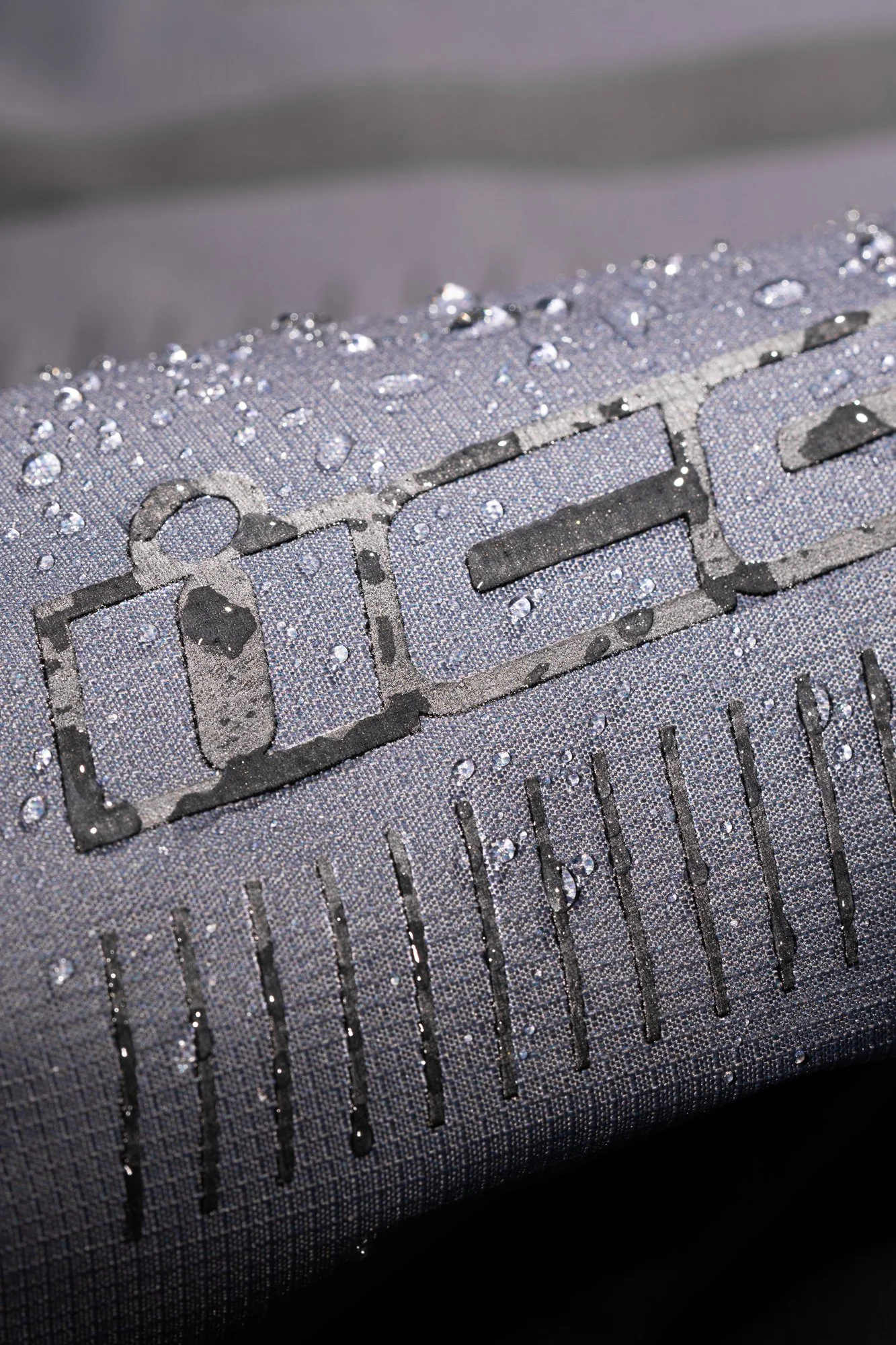 PDX3Jacket_Grey_WetDetail.jpg
