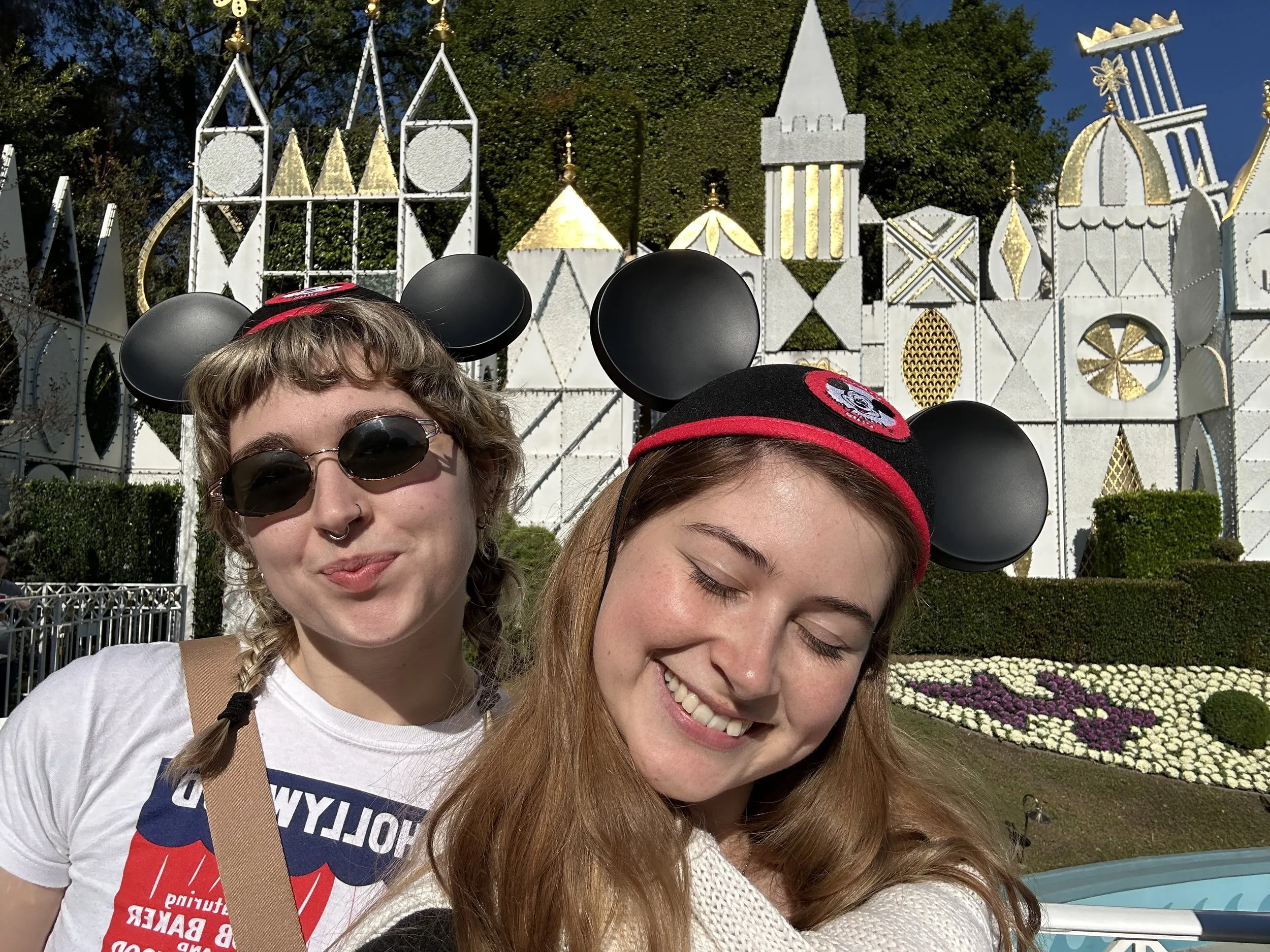 maddie and allison its a small world.jpg