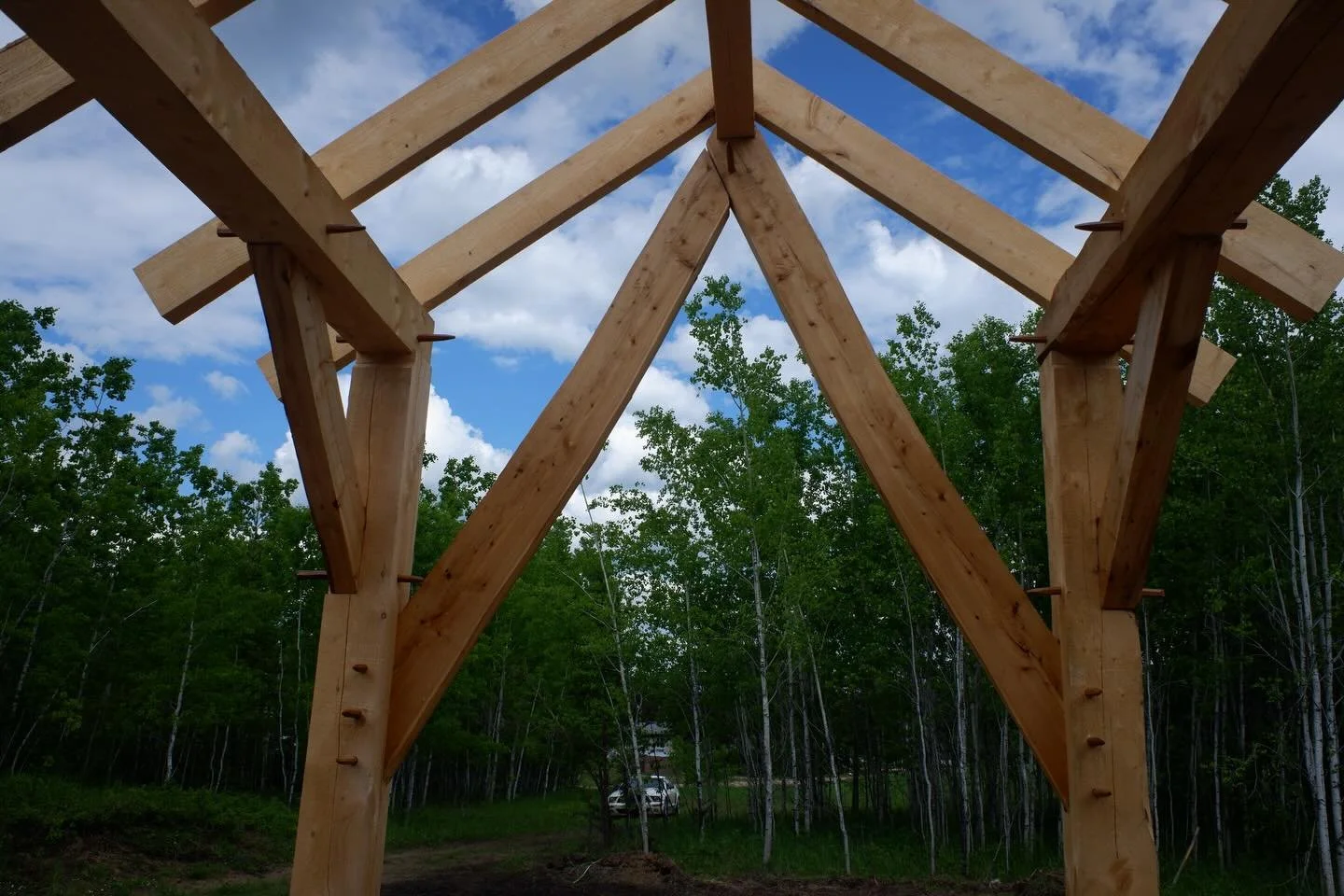 Delivered this little cruck frame up to Smith, Alberta, right on the Athabasca river. We had never been that far north and got to see some pretty country. Thanks to my wife for coming along, lending a hand and taking some pictures.