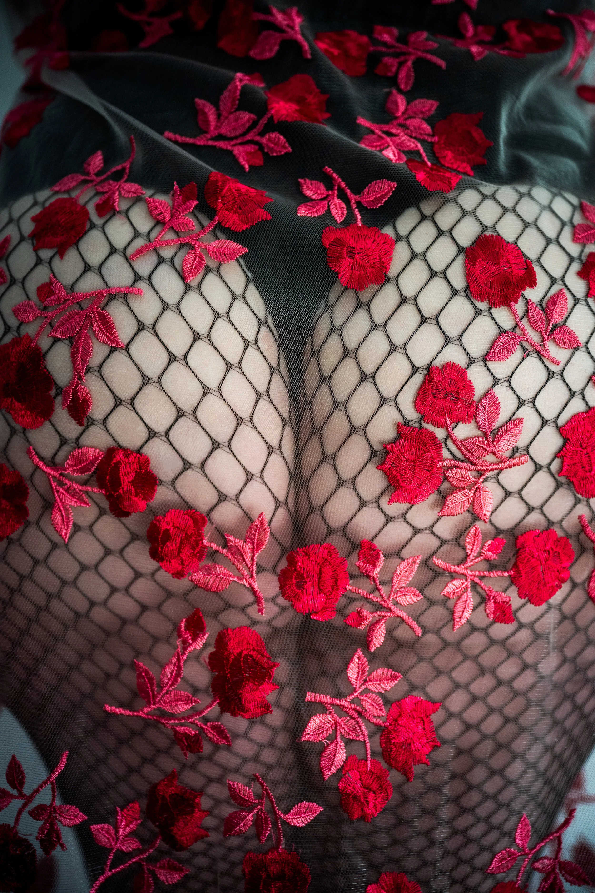 Confident woman in fishnet stocking photographed by Eye Candy Boudoir, Westchester, NY.