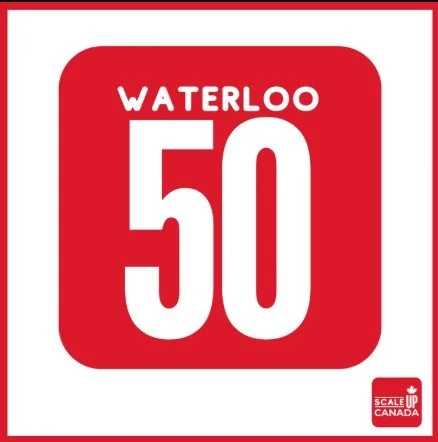 Red square sign with rounded edges displaying the number 50 and the word Waterloo above it, and a small logo in the bottom right corner indicating Scale Up Canada.