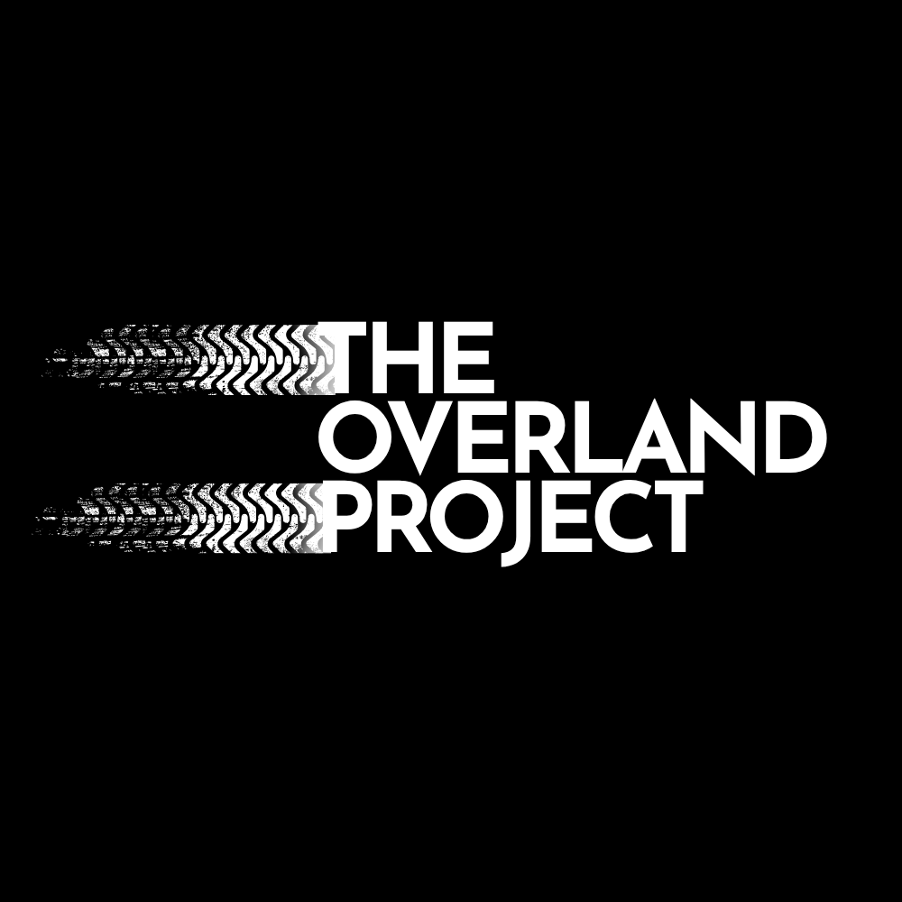 Black background with white text that reads 'The Overland Project' and shows horizontal glitch effect.
