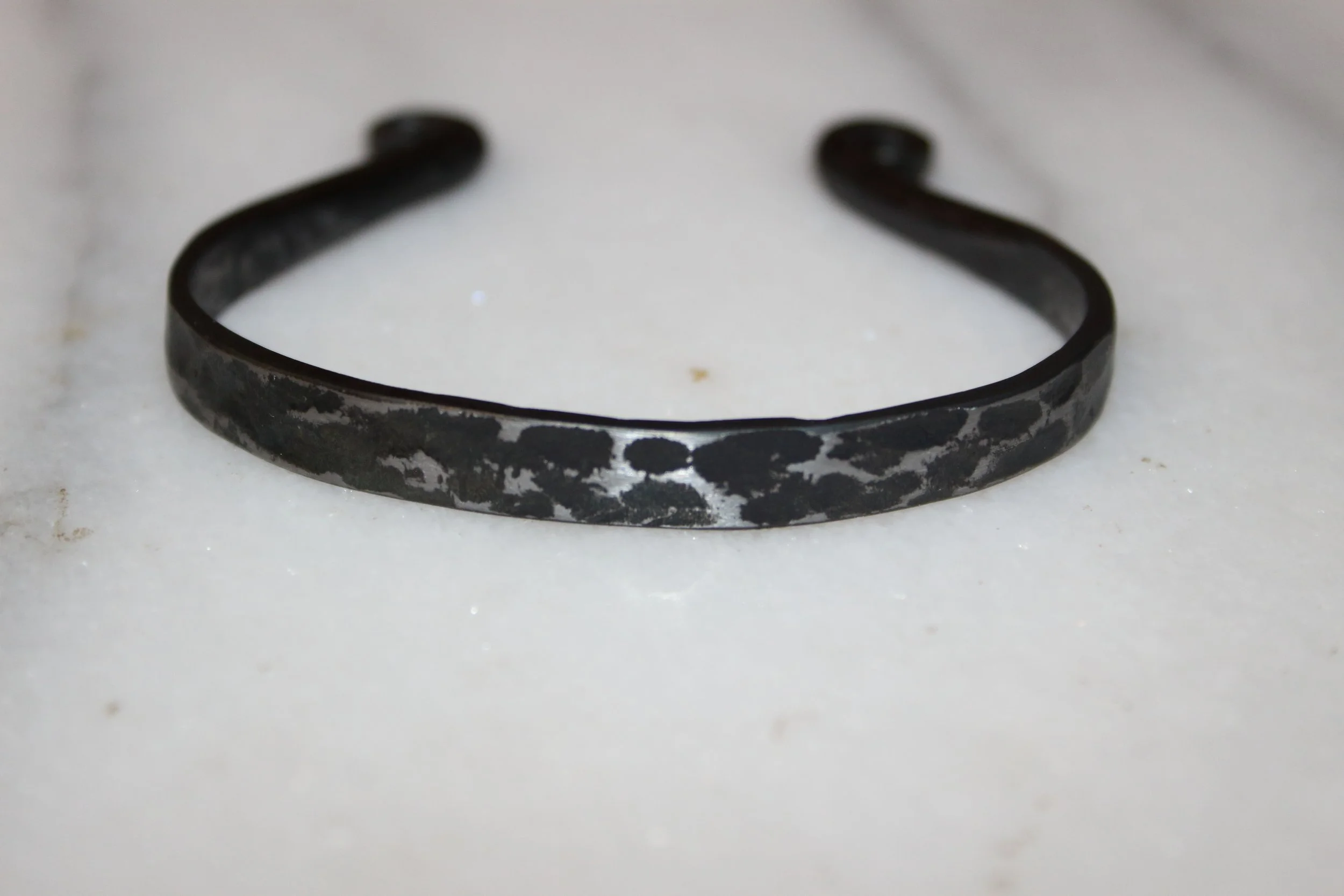 Hand forged leopard pattern bangle