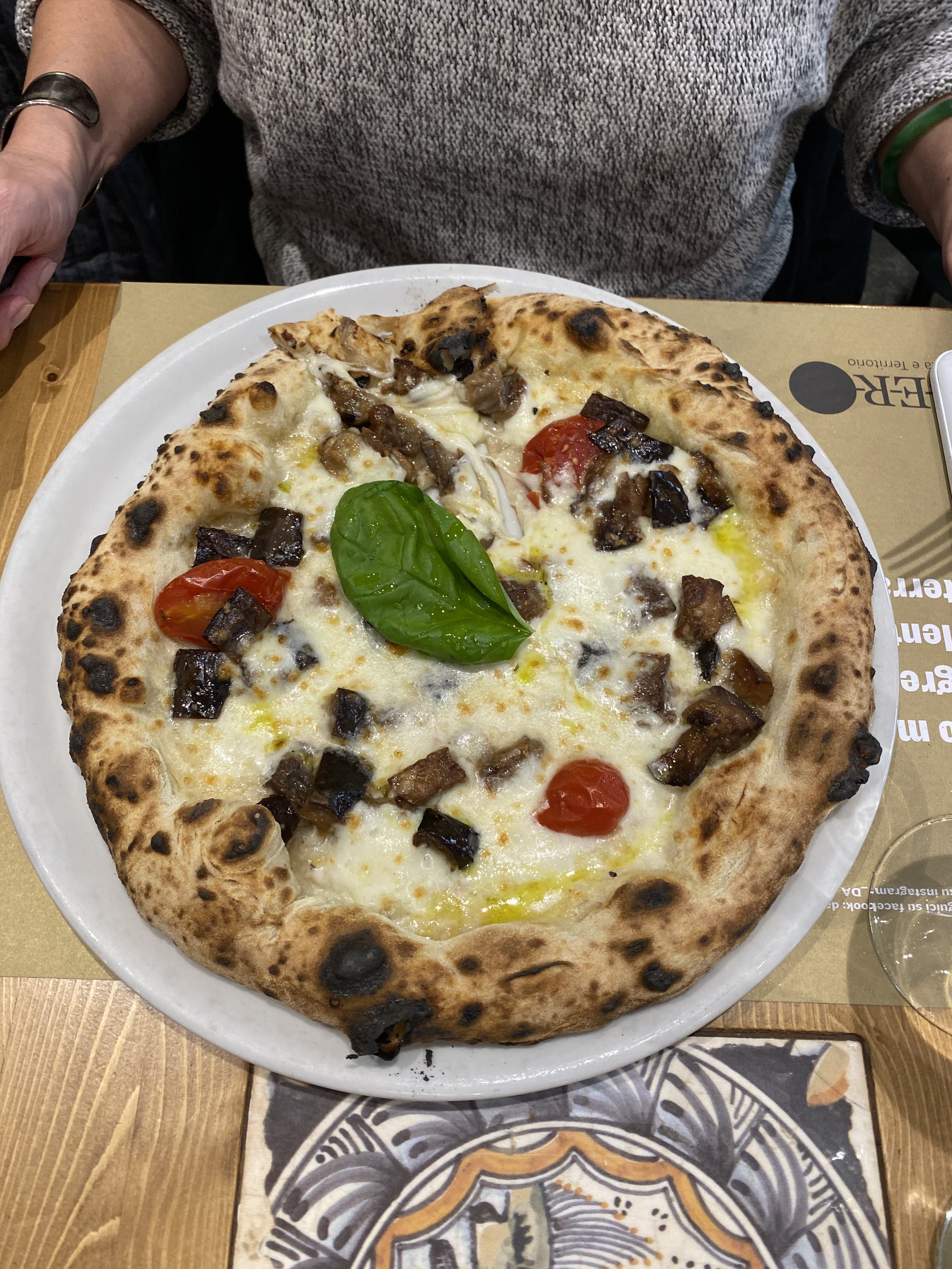 Mushrooms, arugula, eggplant, tomatoes, and premium cheese.