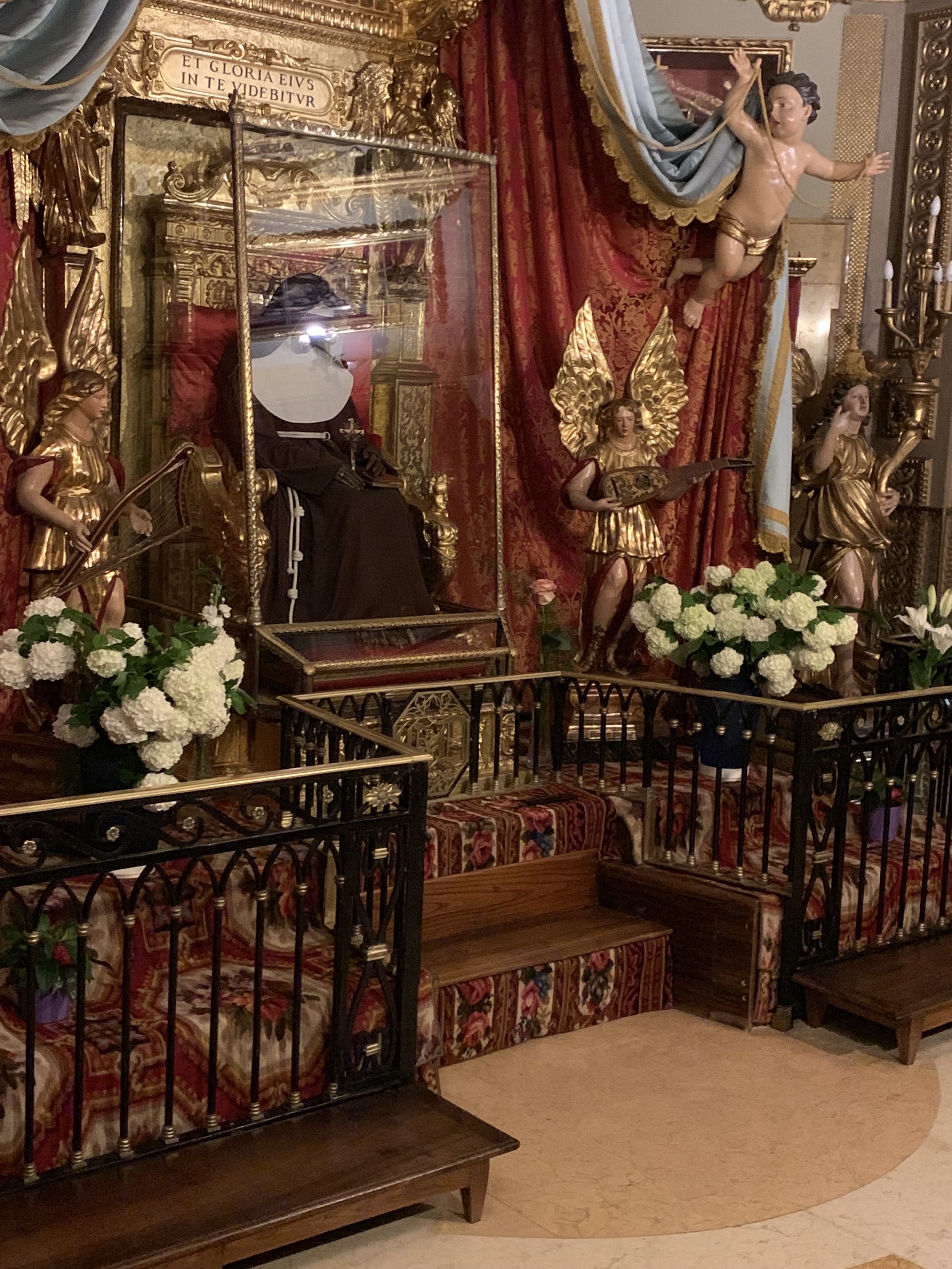 …a mummified nun, St. Catherine of Bologna, is in her glass case in the church’s side chapel.