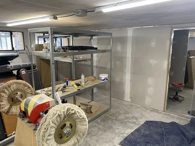 Another view of the wall separating the garage space from the workshop.