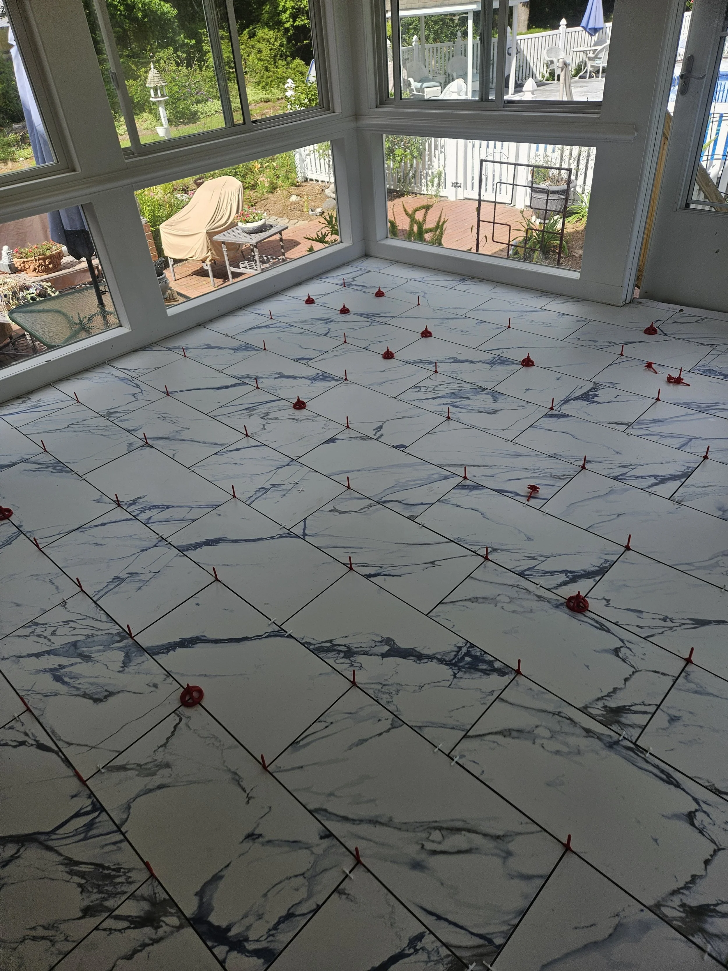 blue marbled tile in a sunroom