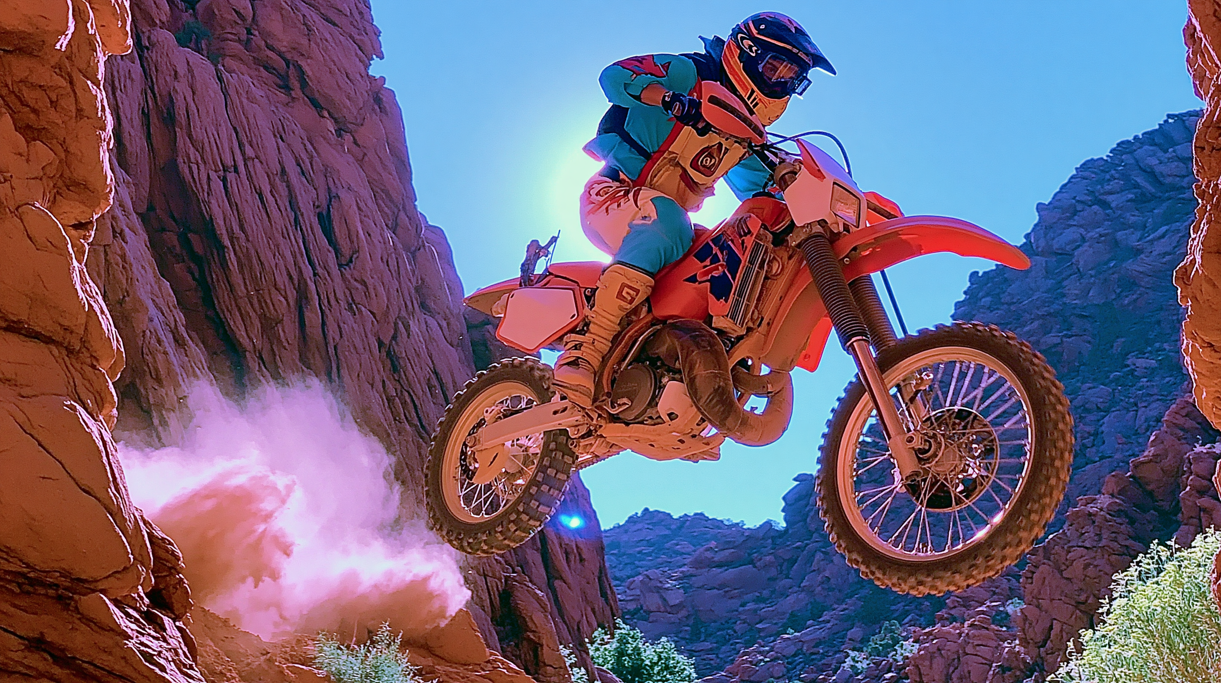 4 hbcoop_Motorcyclist_jumping_over_canyon_gap_bike_and_rider_pe_549ce2bf-b101-4fed-9c8d-664bd2b60416_2.png