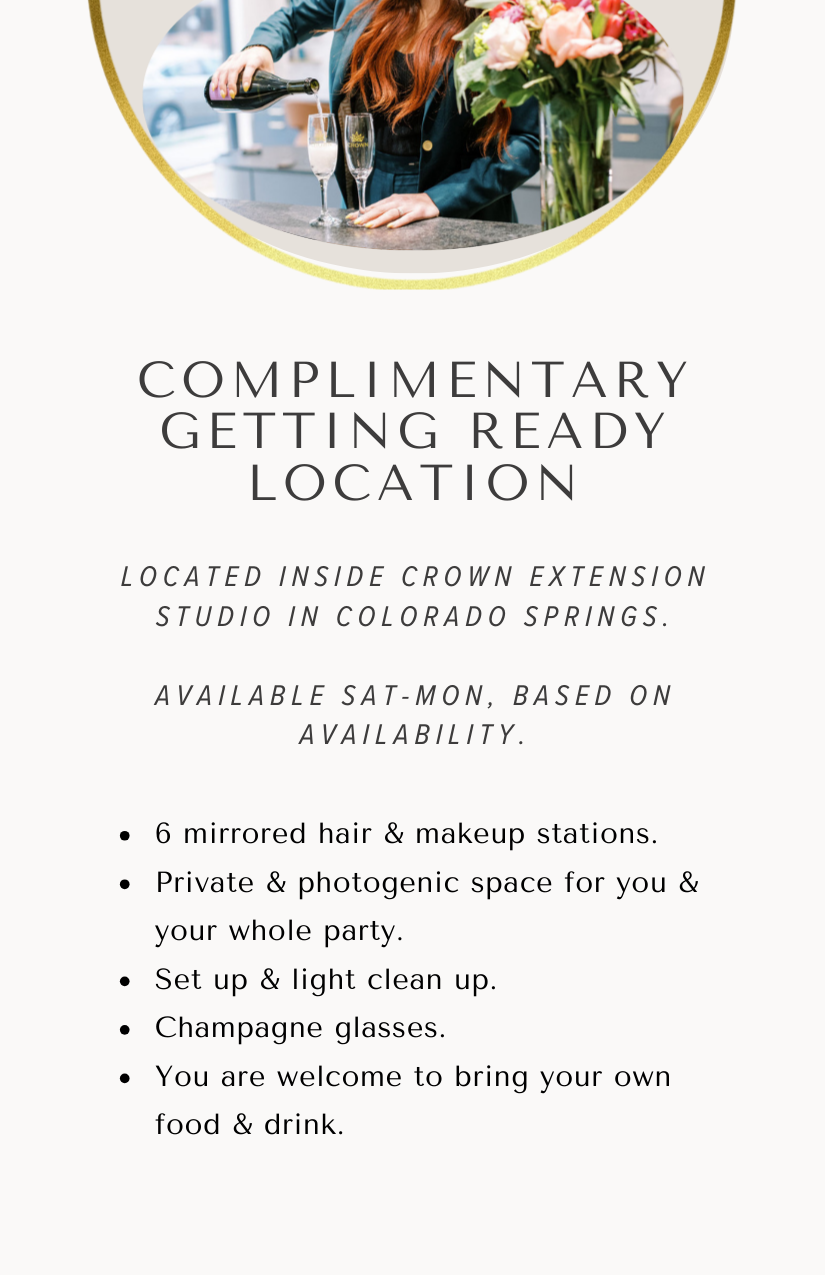 A person pouring champagne into glasses at a counter with a bouquet of flowers in the background.