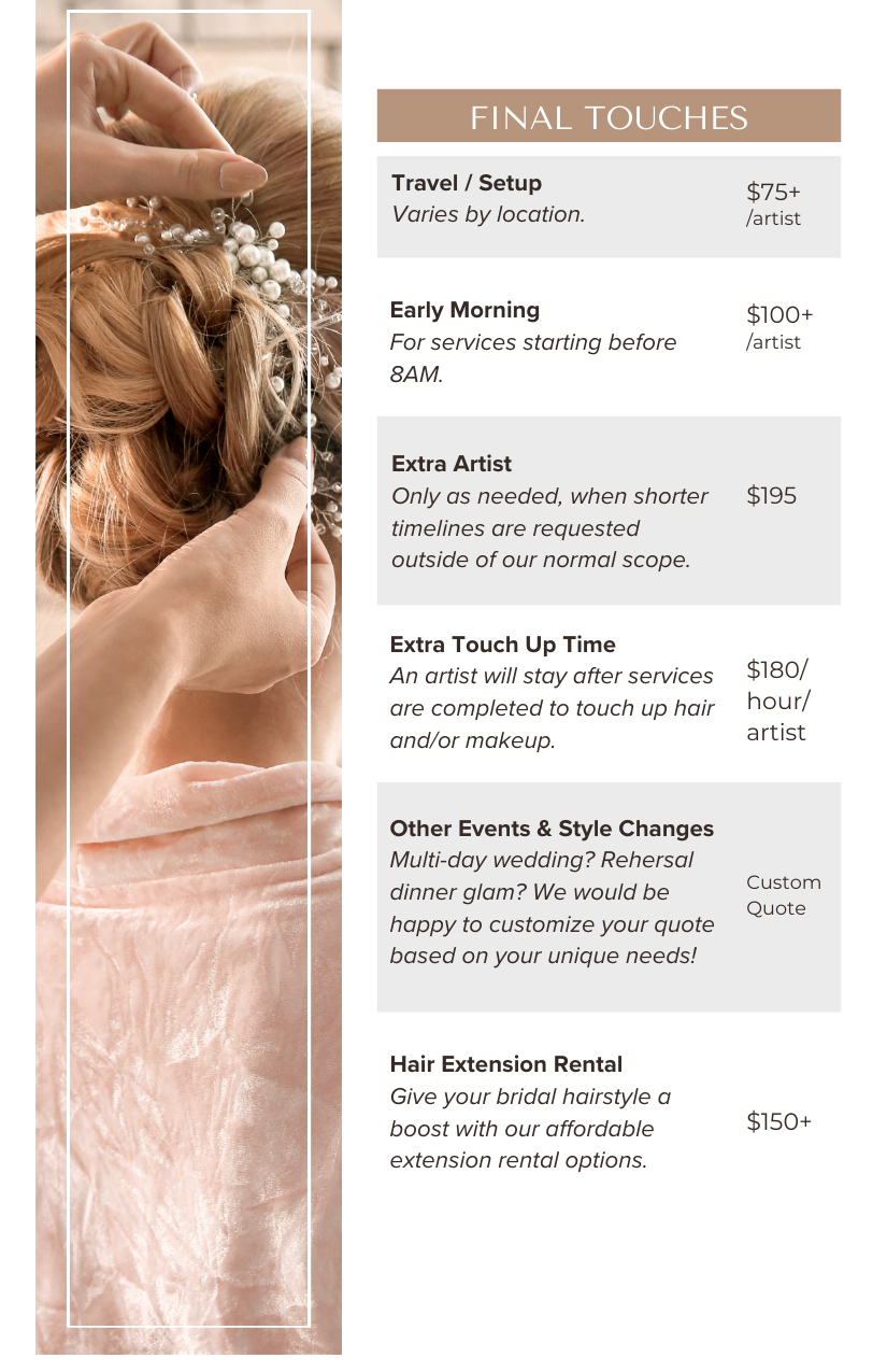 Close-up of a hairstylist's hands arranging a bride's hair, which is styled with a pearl hair accessory.