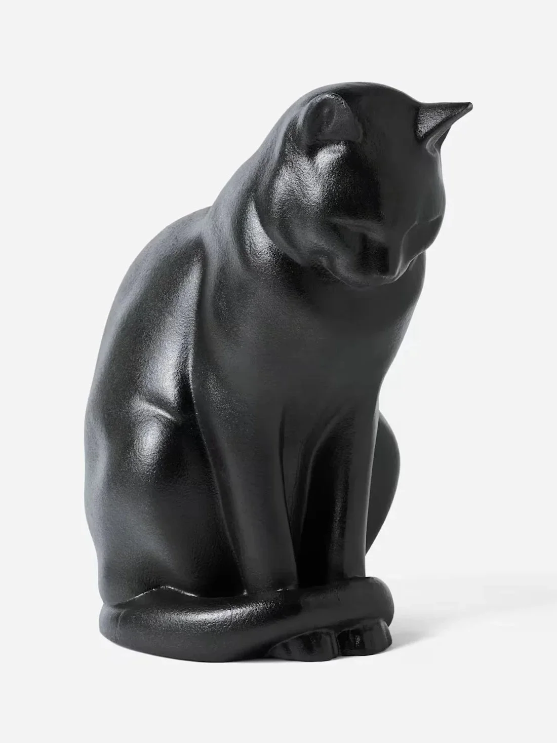 Black ceramic cat figurine sitting upright with a sleek, glossy finish. Interior decor figurine
