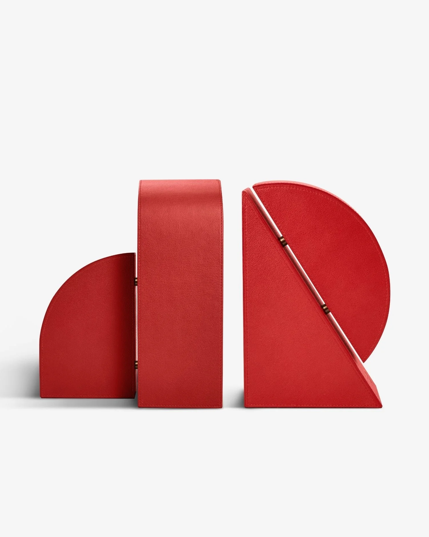 geometric red bookends with semi-circular and rectangular shapes,