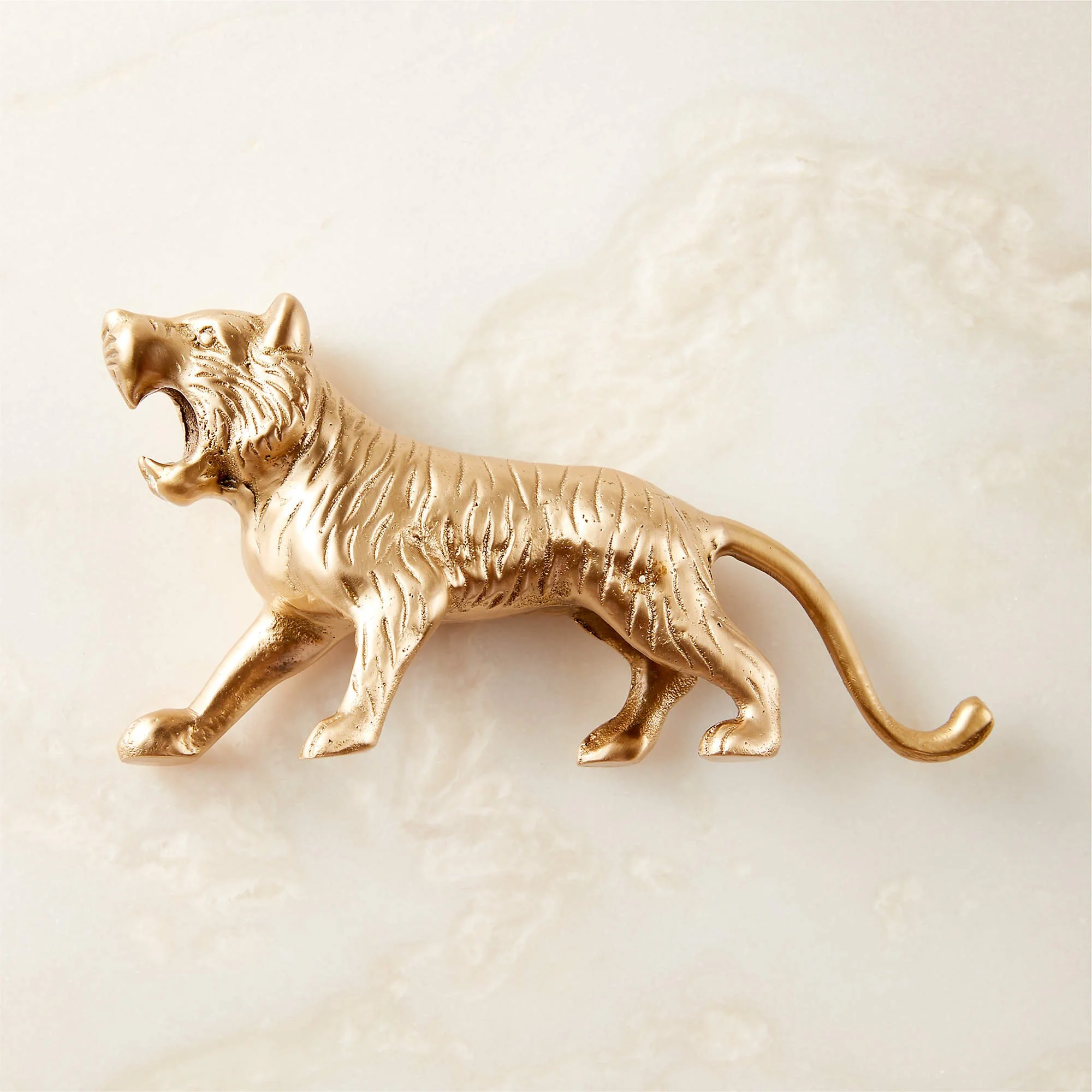 Gold-bottle opener tiger figure with jaws for the bottle clasp