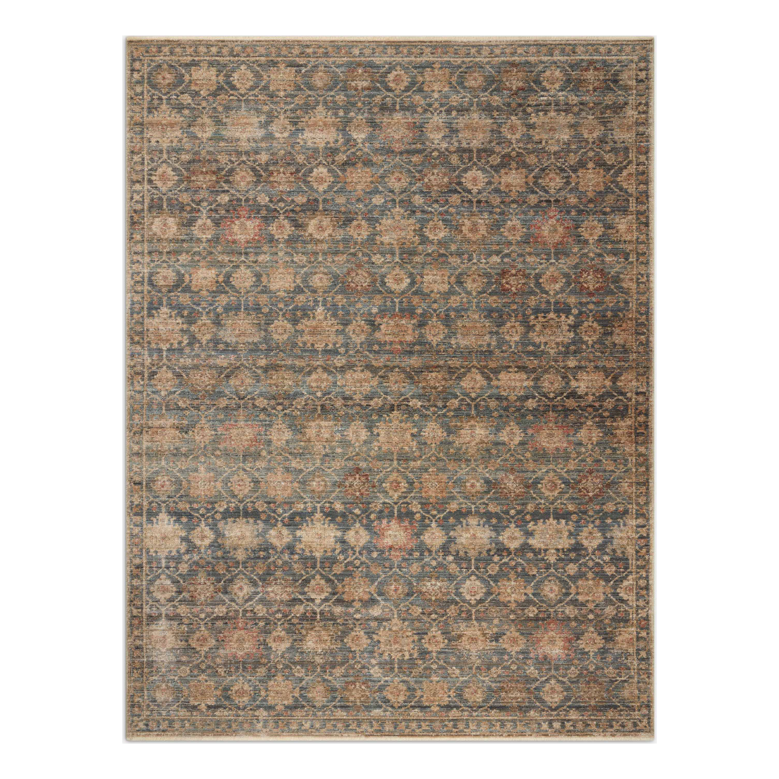 A vintage-style area rug with a worn, distressed look. It features a traditional floral and geometric pattern in muted colors of blue, beige, and reddish-brown.