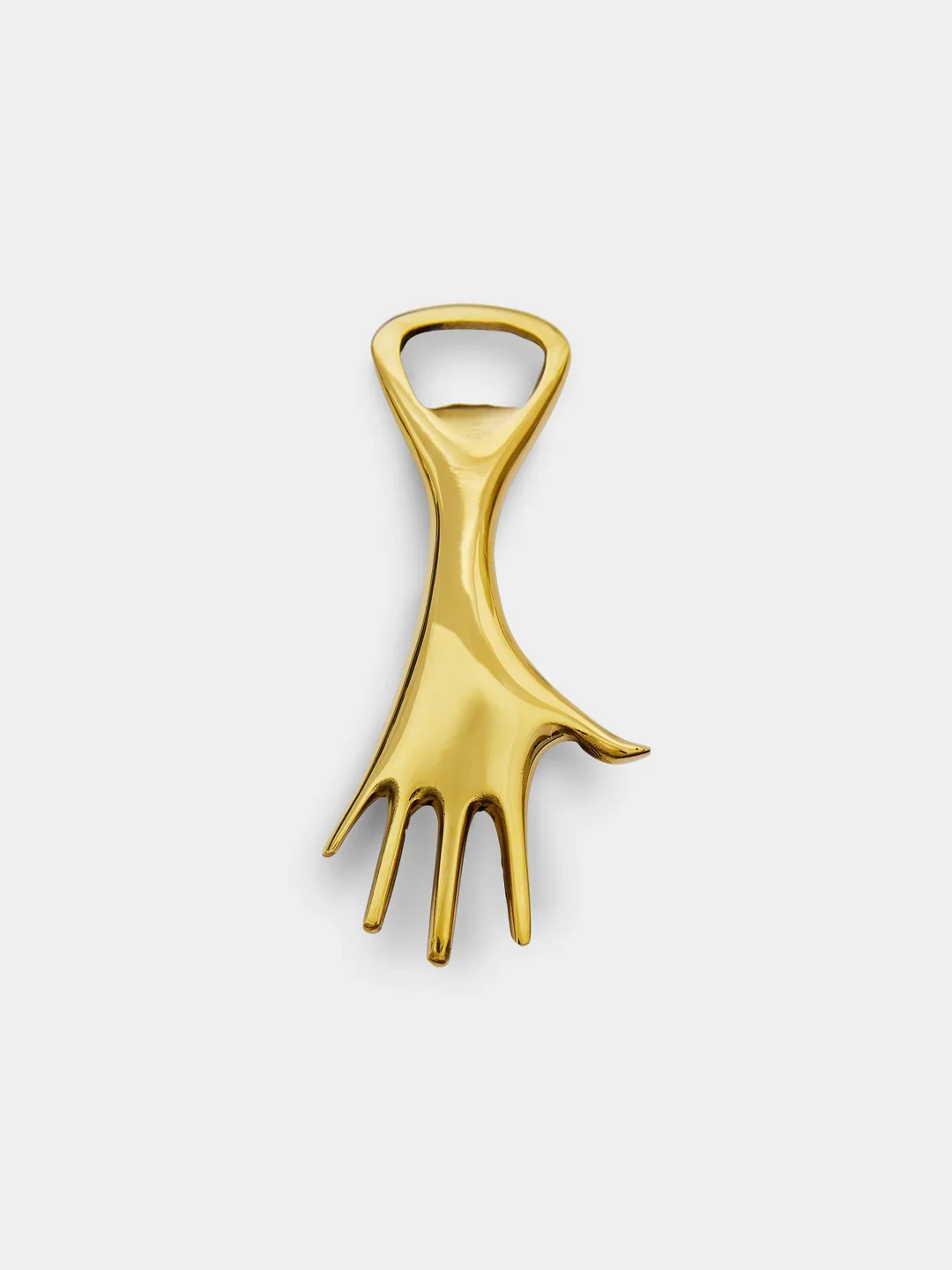 Gold bottle opener shaped like a hand with four fingers and a thumb