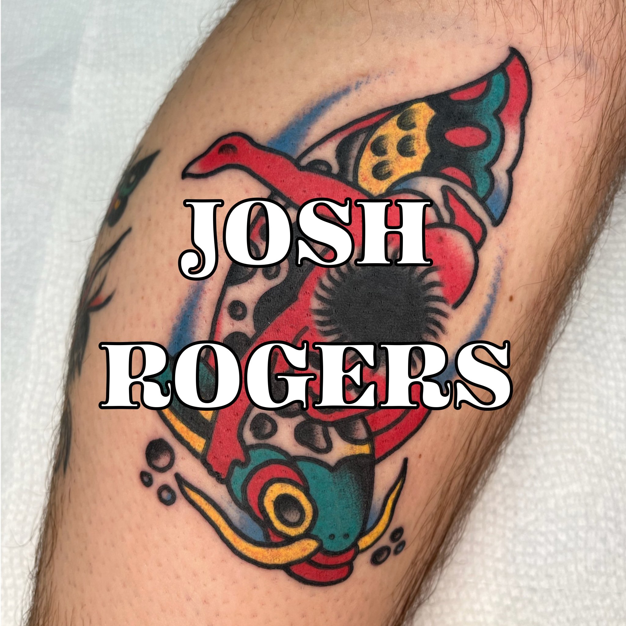 Tattoo by Josh Rogers in Regina Saskatchewan of Kintaro with a fish done in an American Traditional style with red, green, and yellow.