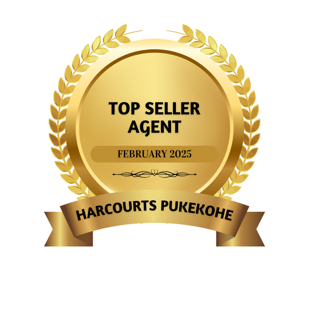 Gold award badge with laurel wreath, text reads 'Top Seller Agent February 2025, Harcourts Pukekohe'.