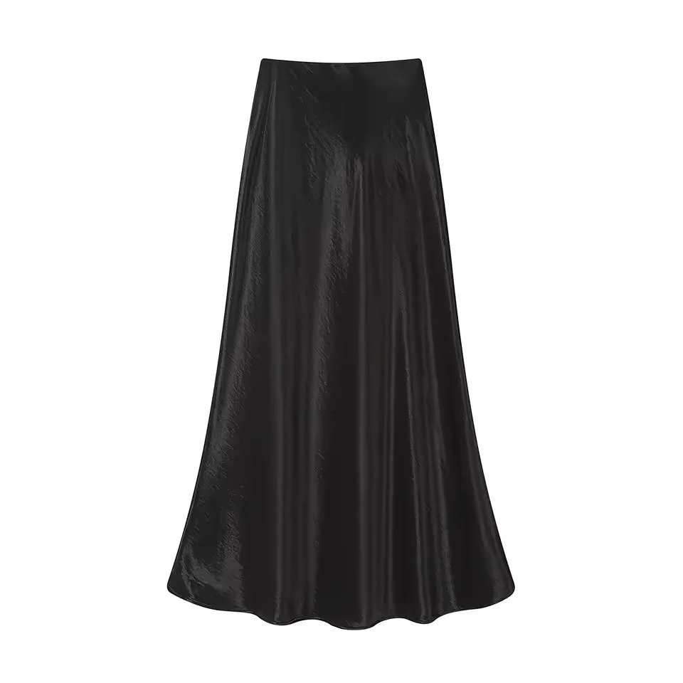 Black leather or vinyl long skirt with a shiny finish.